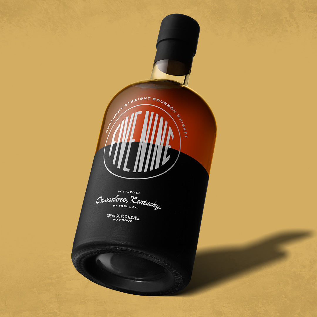 Five Nine Kentucky Straight Bourbon Whiskey bottle, aged in American oak barrels with rich amber color.