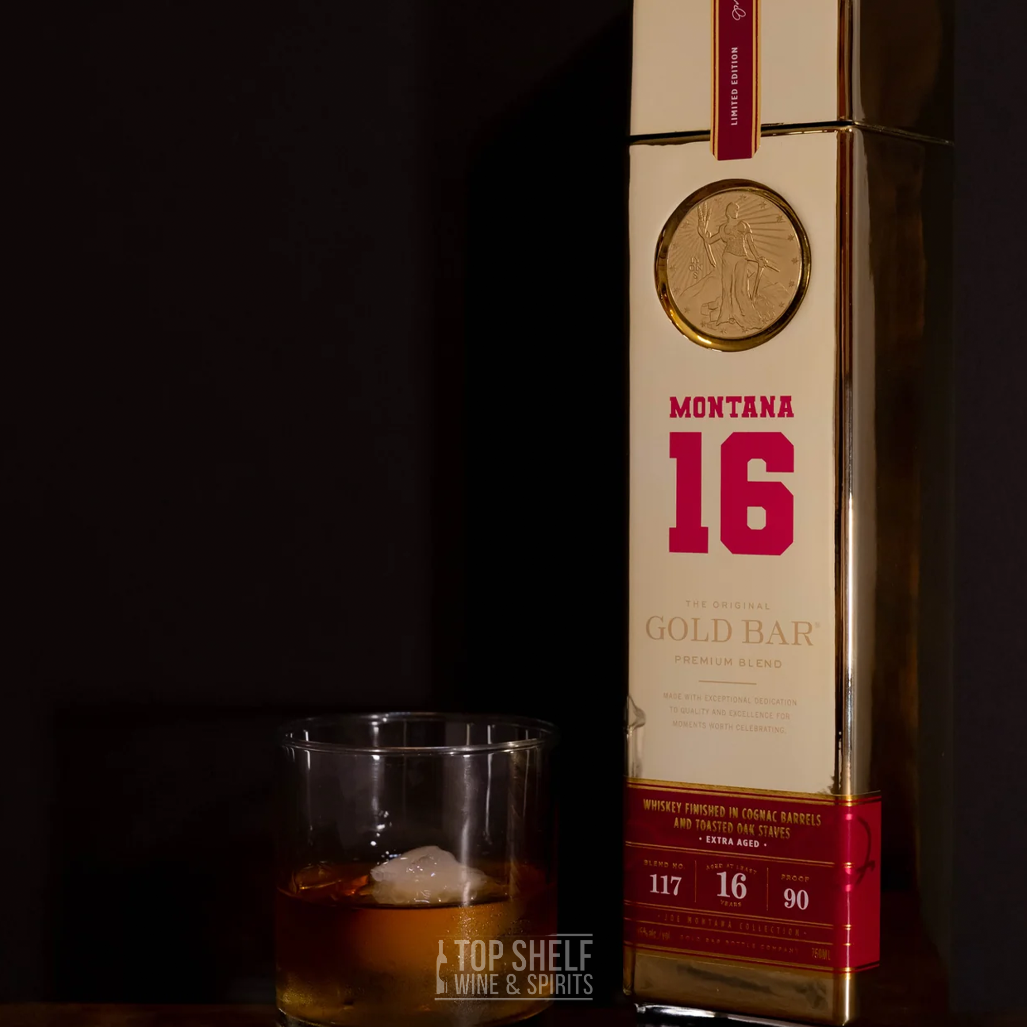 Gold Bar Joe Montana Blend 117 whiskey bottle and glass with ice, celebrating 16 years and San Francisco 49ers heritage.