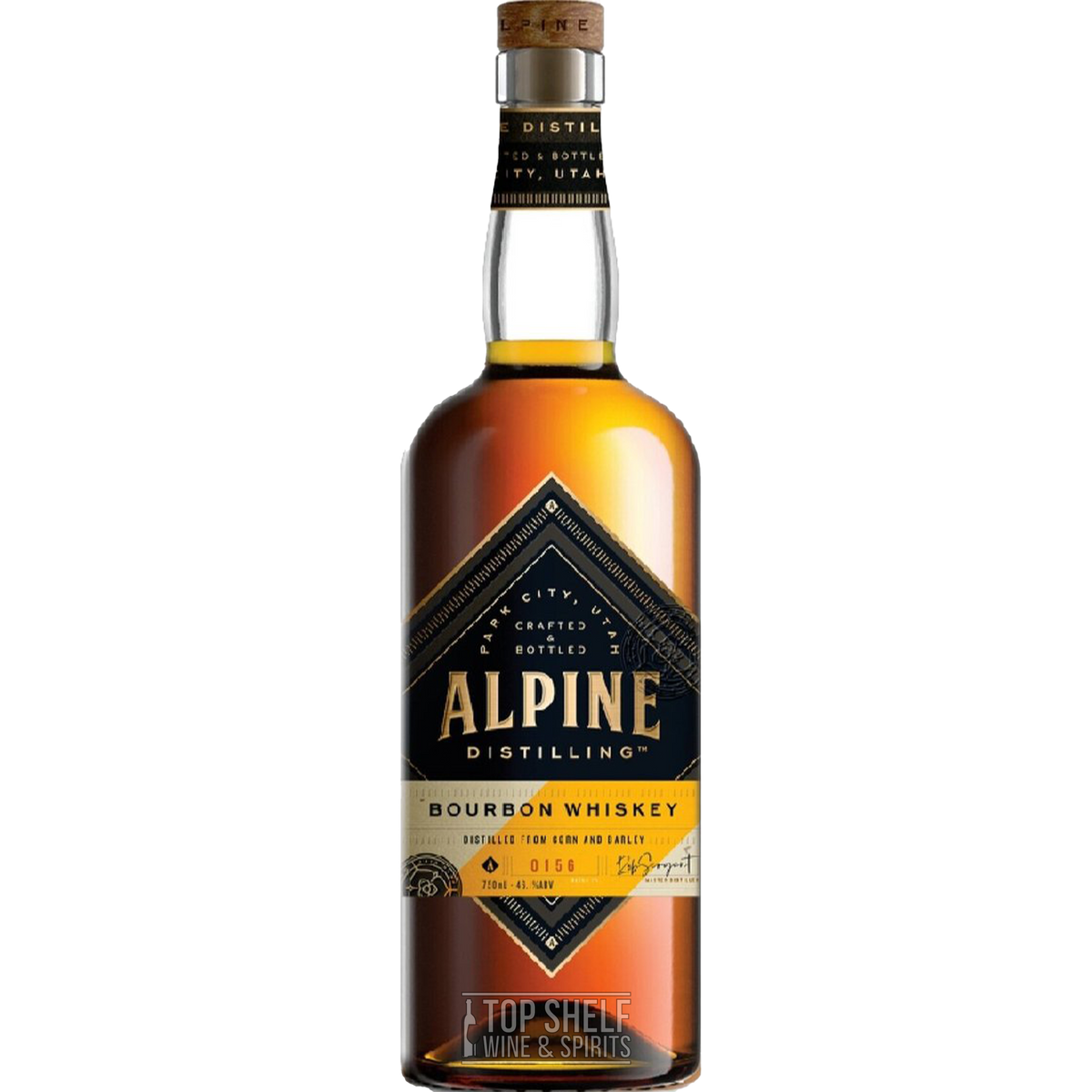Alpine Distilling Four Grain Bourbon whiskey bottle, showcasing its rich amber color and elegant label.