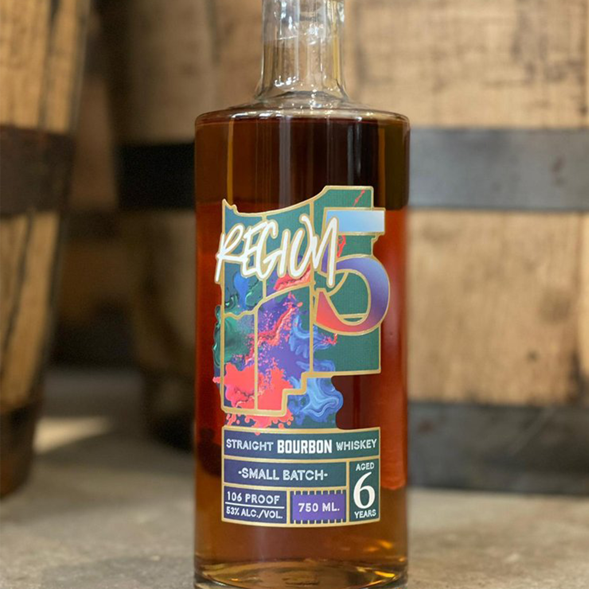 Region 5 Small Batch 6 Year Bourbon bottle with colorful label, aged 6 years, 106 proof, distilled in Indiana.