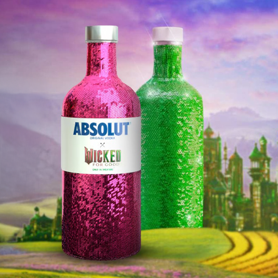 Absolut X Wicked Limited Edition Vodka in reversible sequin sleeve, showcasing pink and green colors.