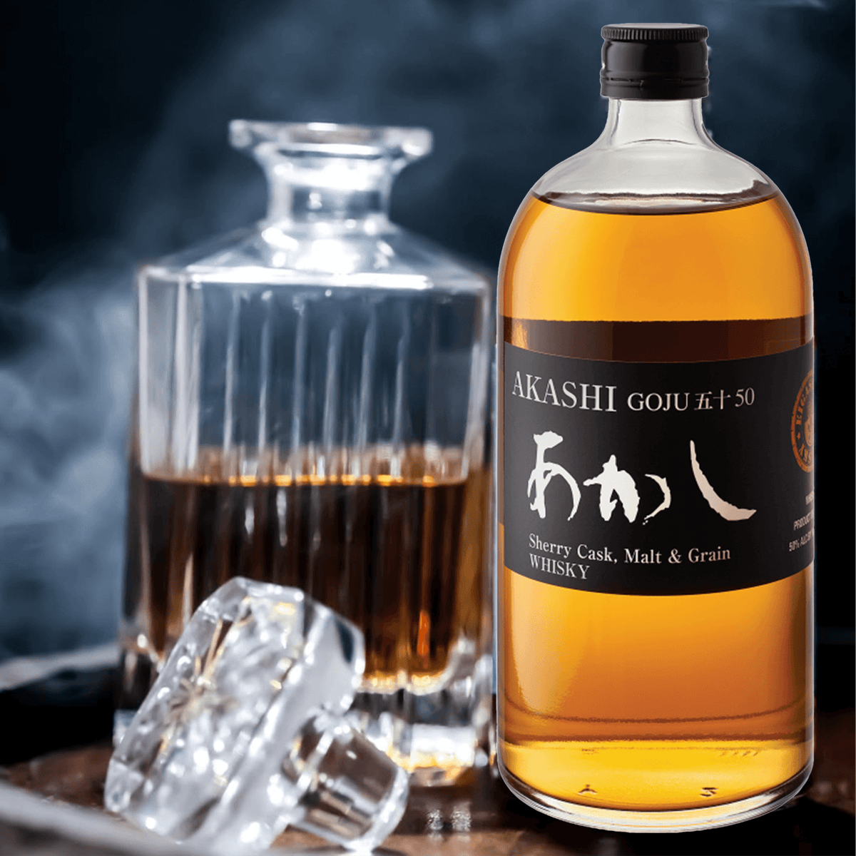 Akashi Goju 50 Sherry Cask Malt and Grain Whisky bottle beside a glass, showcasing Japanese whisky craftsmanship.