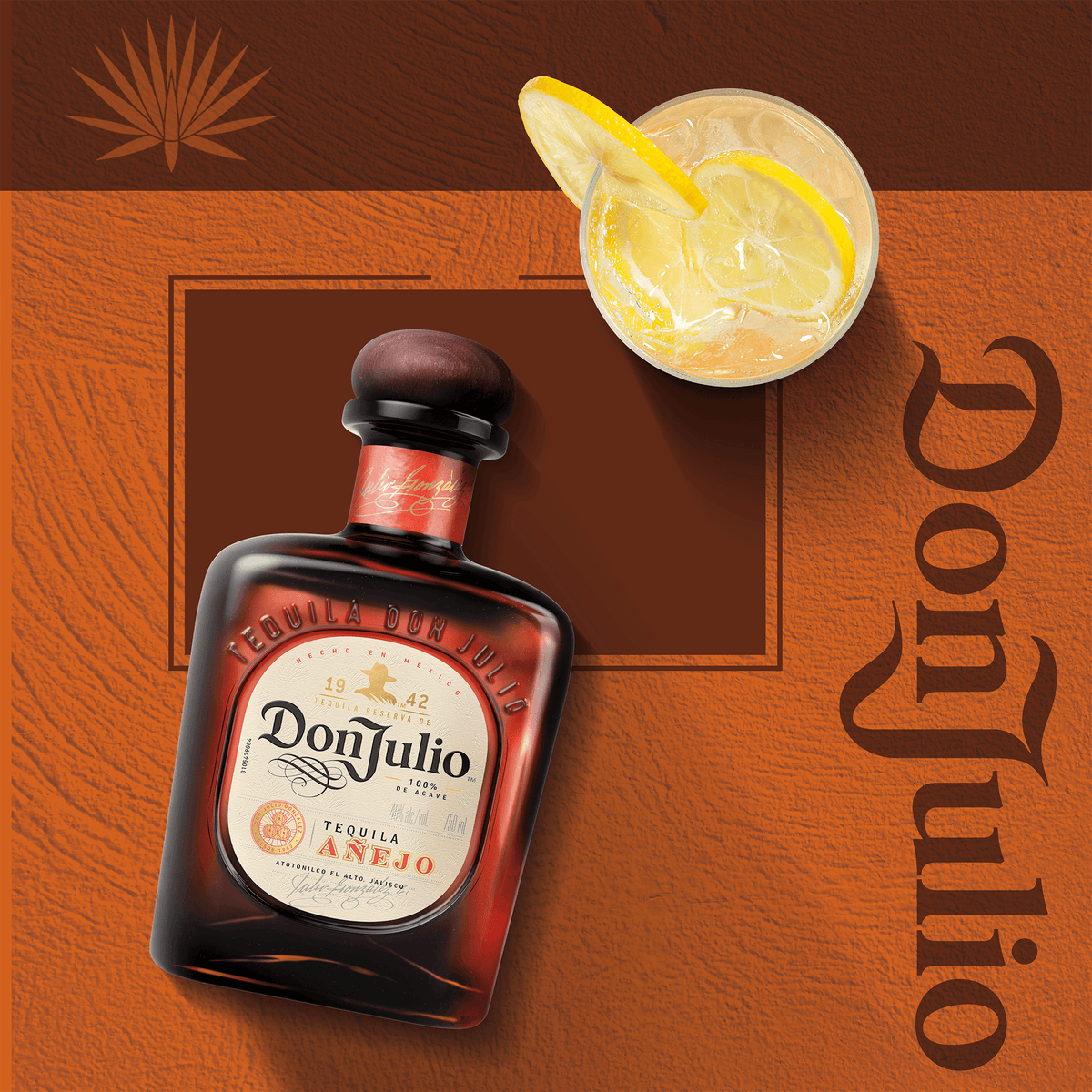 Don Julio Añejo Tequila bottle with cocktail and lemon slice, showcasing rich color and elegant design.
