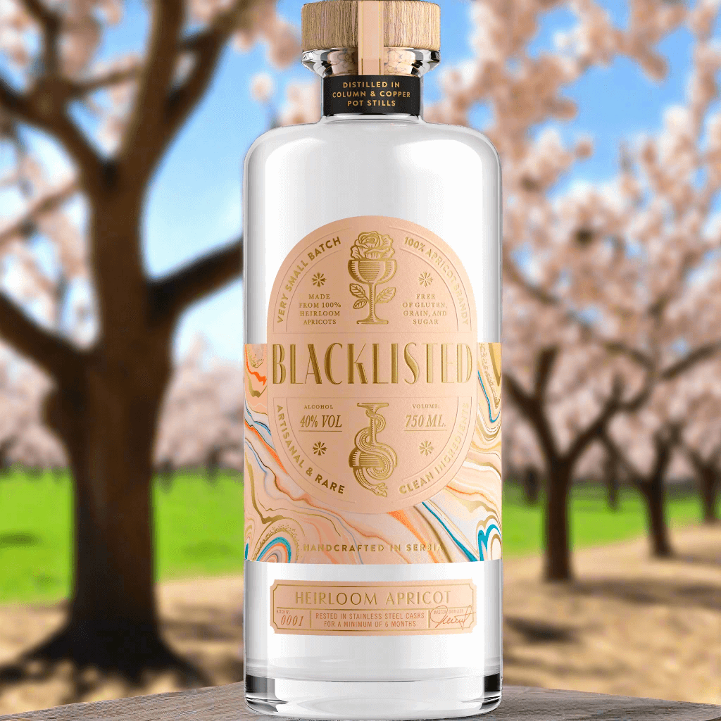 Blacklisted Heirloom Apricot Brandy bottle, handcrafted with heirloom apricots, 40% ABV, in a picturesque orchard setting.