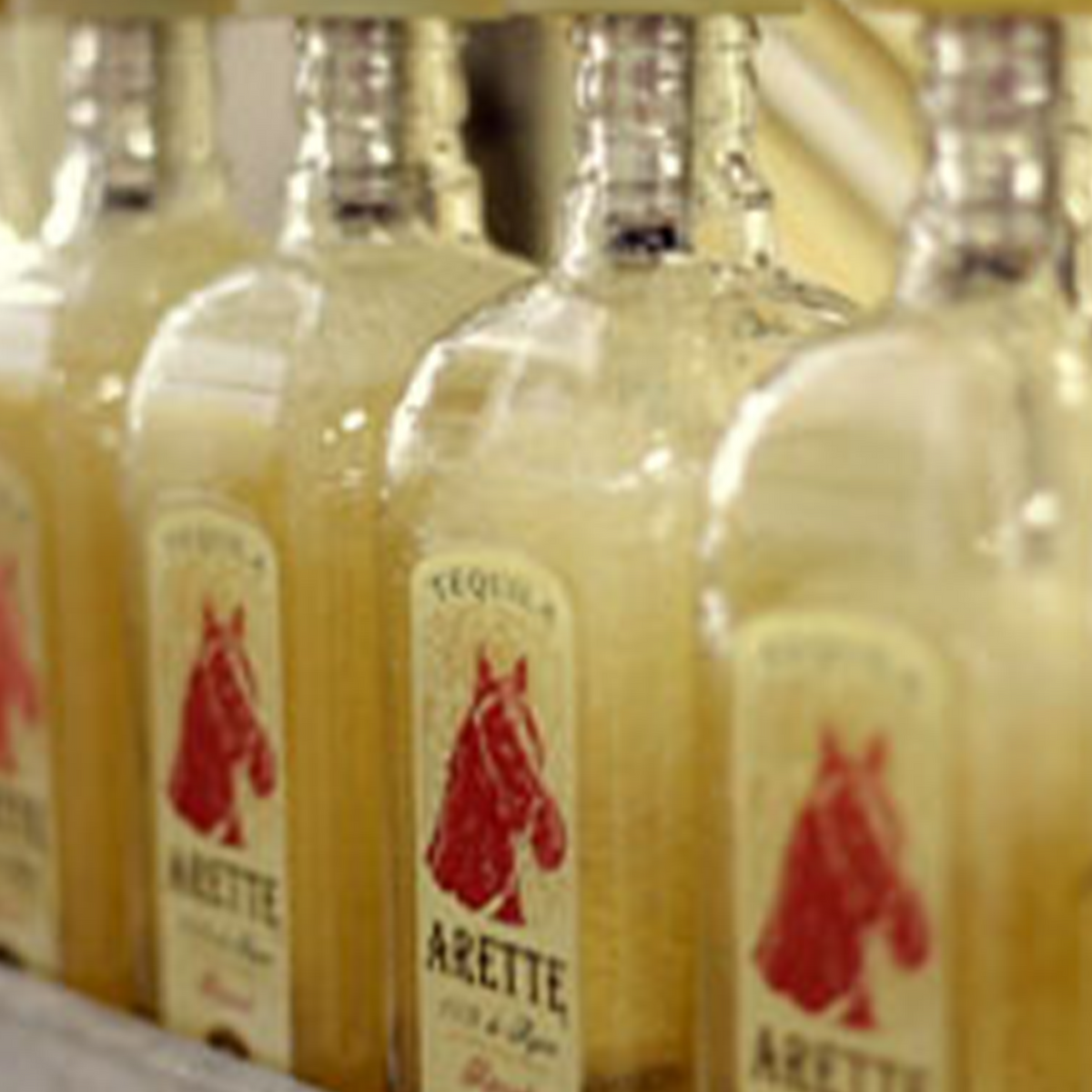 Arette Fuerte Blanco Artesanal Tequila bottles displayed, showcasing 100% blue agave tequila.
