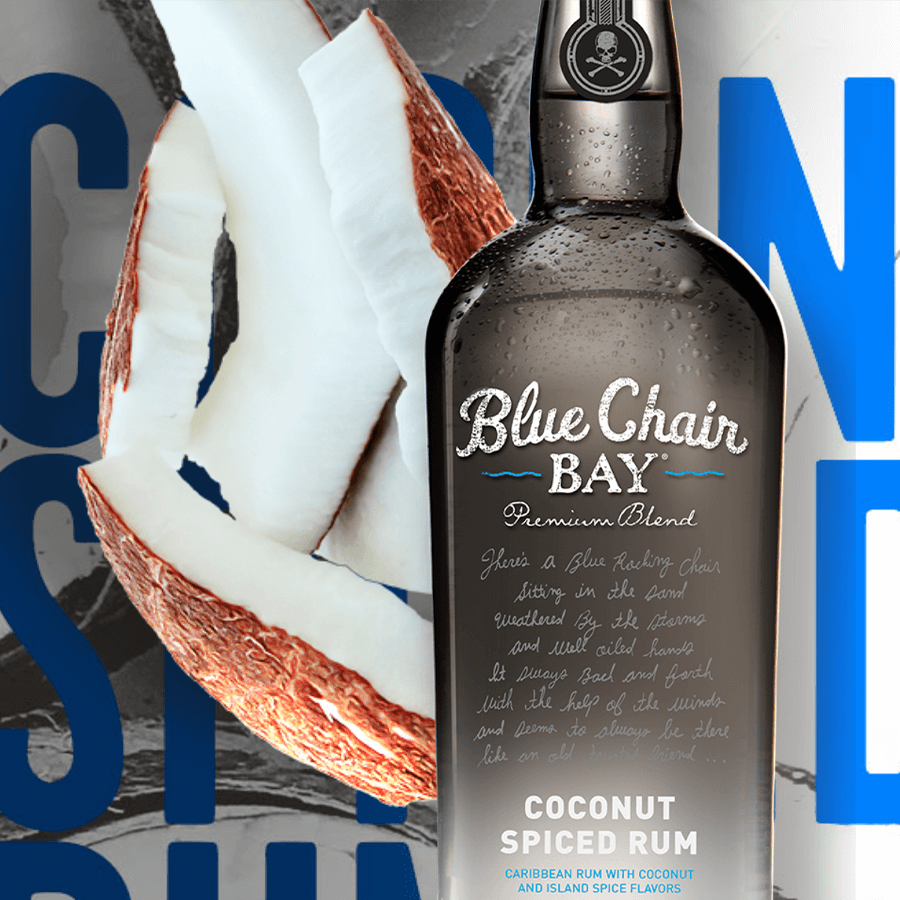 Blue Chair Bay Coconut Spiced Rum bottle with coconut slices, featuring Caribbean spice flavors for refreshing cocktails.
