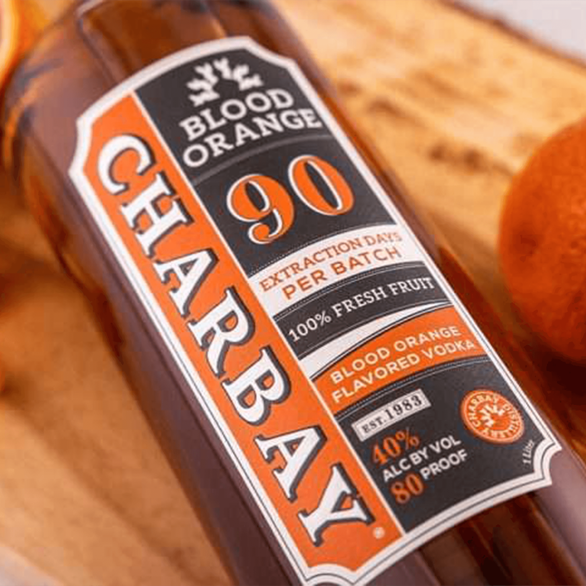 Charbay Blood Orange Vodka bottle featuring fresh fruit and extraction details for premium flavor.
