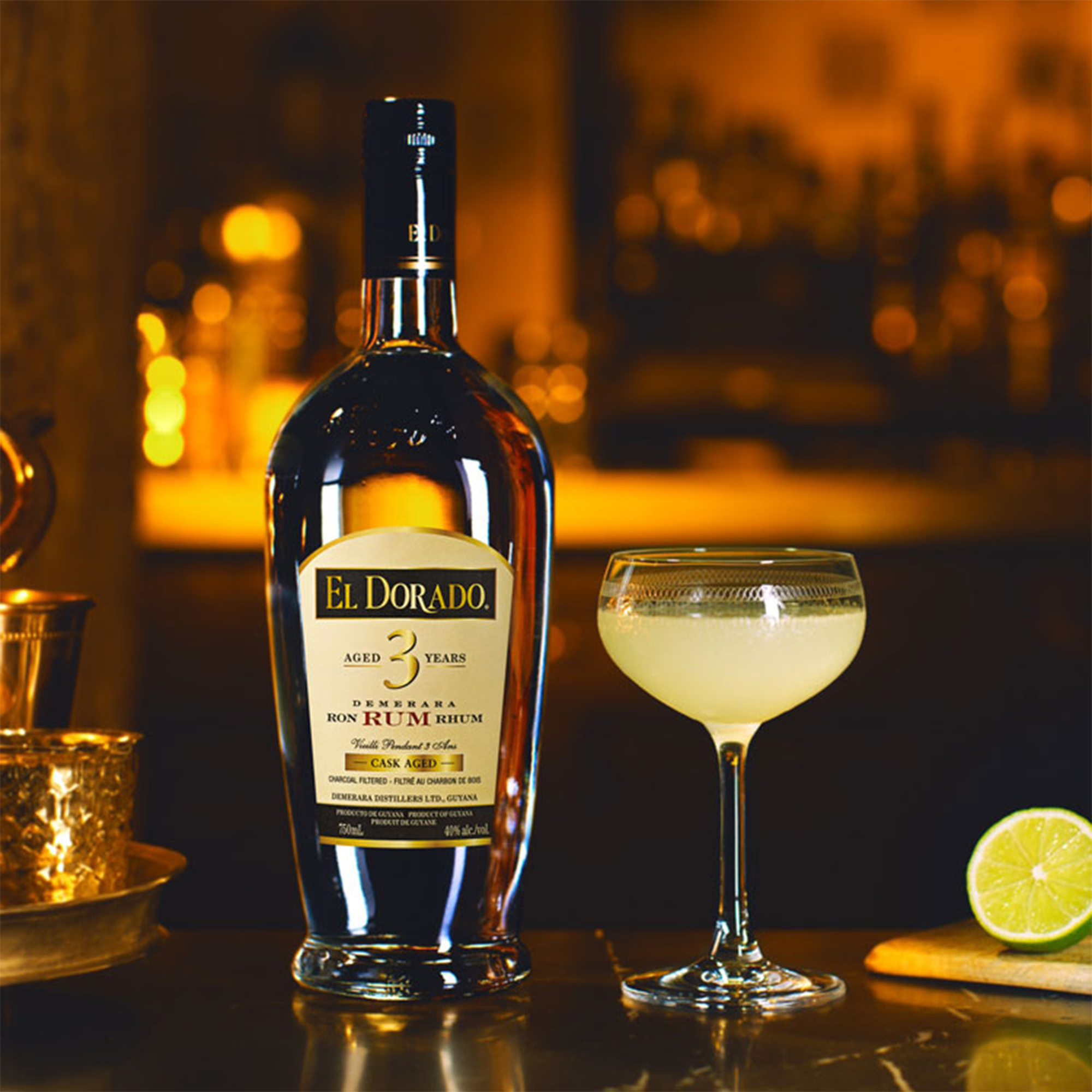 El Dorado 3 Year Demerara Cask Aged Rum bottle with cocktail in a classy bar setting.