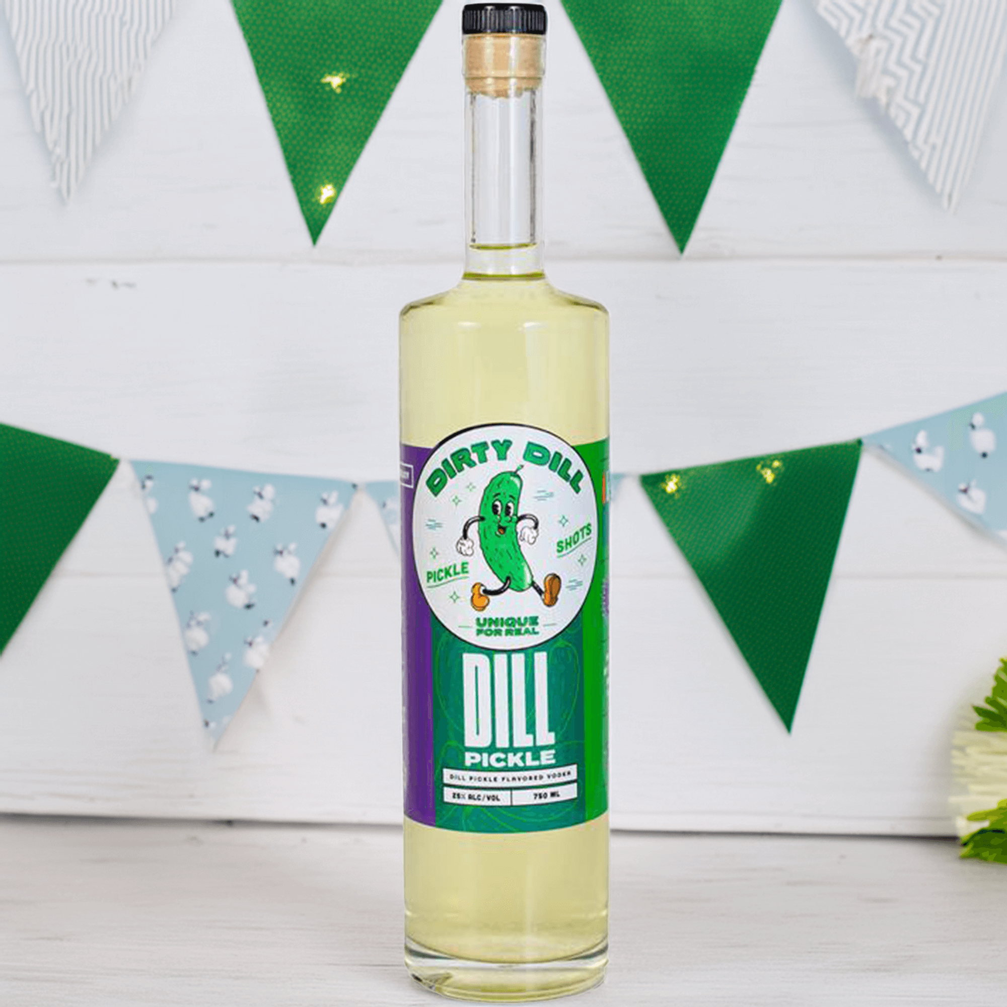 Bottle of Dirty Dill Dill Pickle Vodka with green decorations in the background, showcasing its unique flavor.