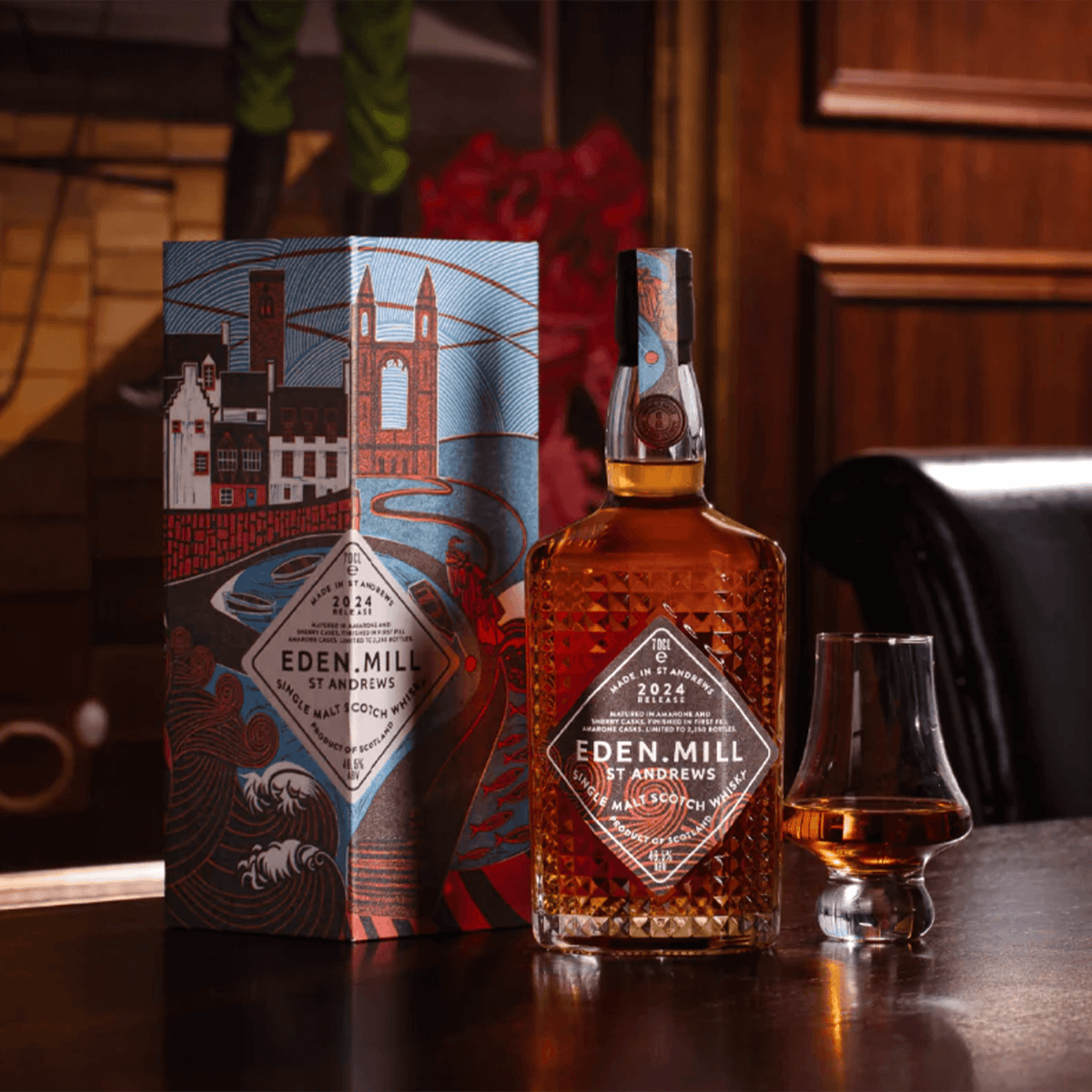 Eden Mill Art of St. Andrews Single Malt 2024 Special Release bottle and packaging on a wooden table