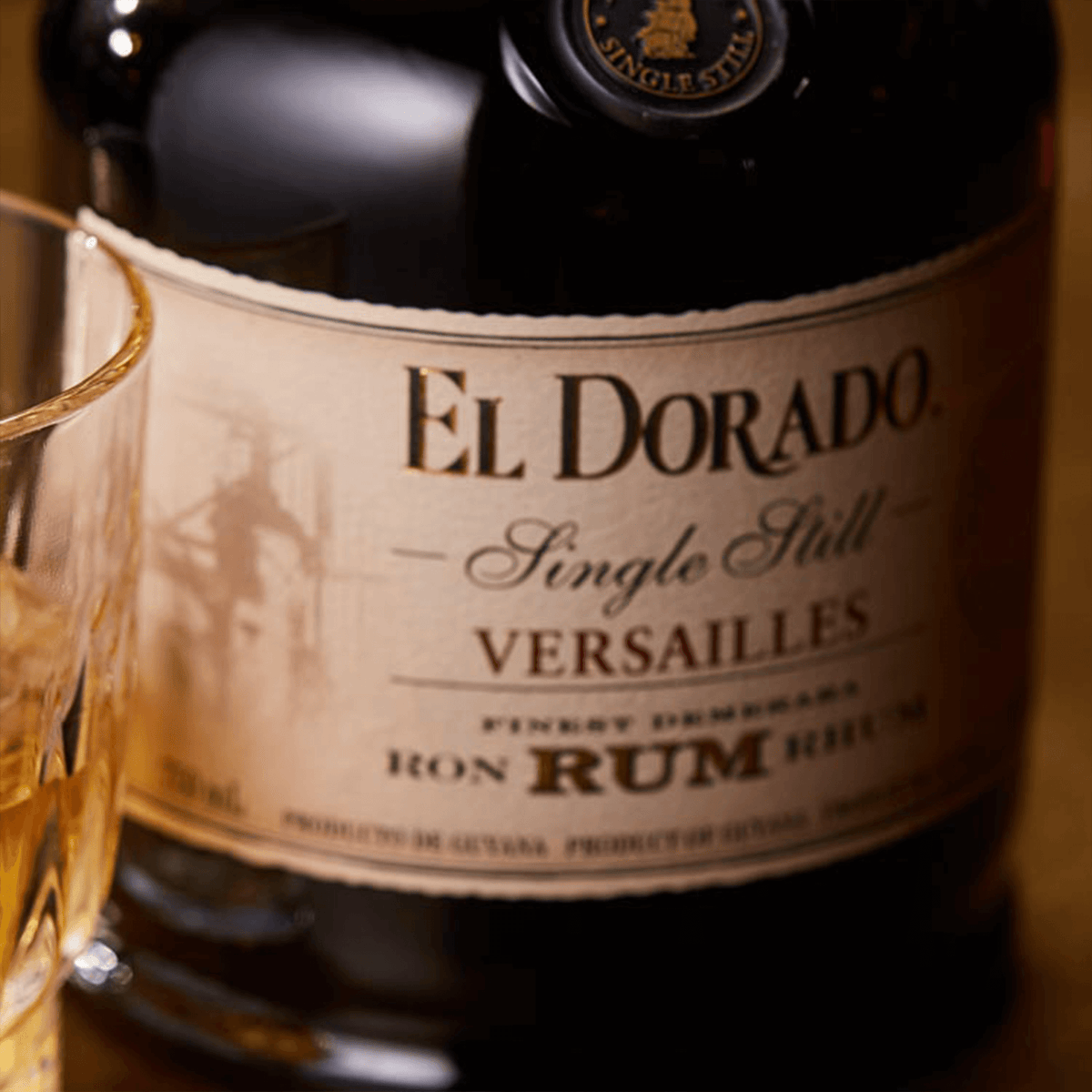 El Dorado Single Still Versailles 2009 rum bottle with glass, showcasing fine Demerara rum aged for 12 years.