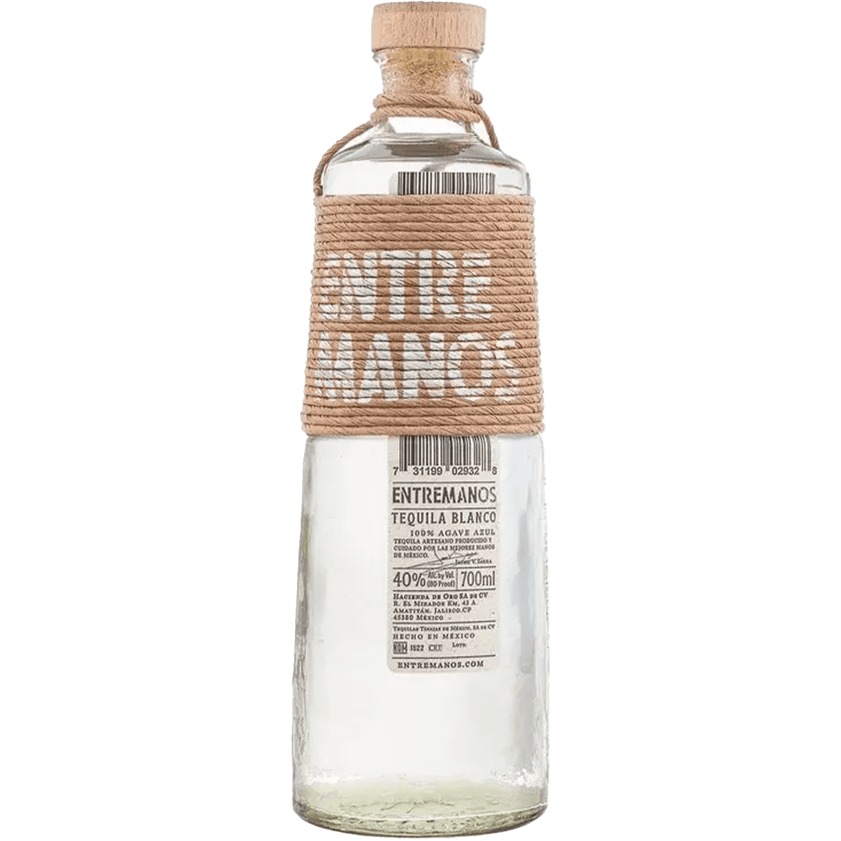Bottle of Entremanos Blanco Tequila 700ml, featuring elegant label and natural cork top, perfect for savoring life.
