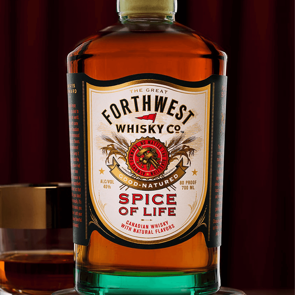 Forthwest Spice Of Life Whisky 700 ml bottle with orange and ginger flavors, featured against a rich background.