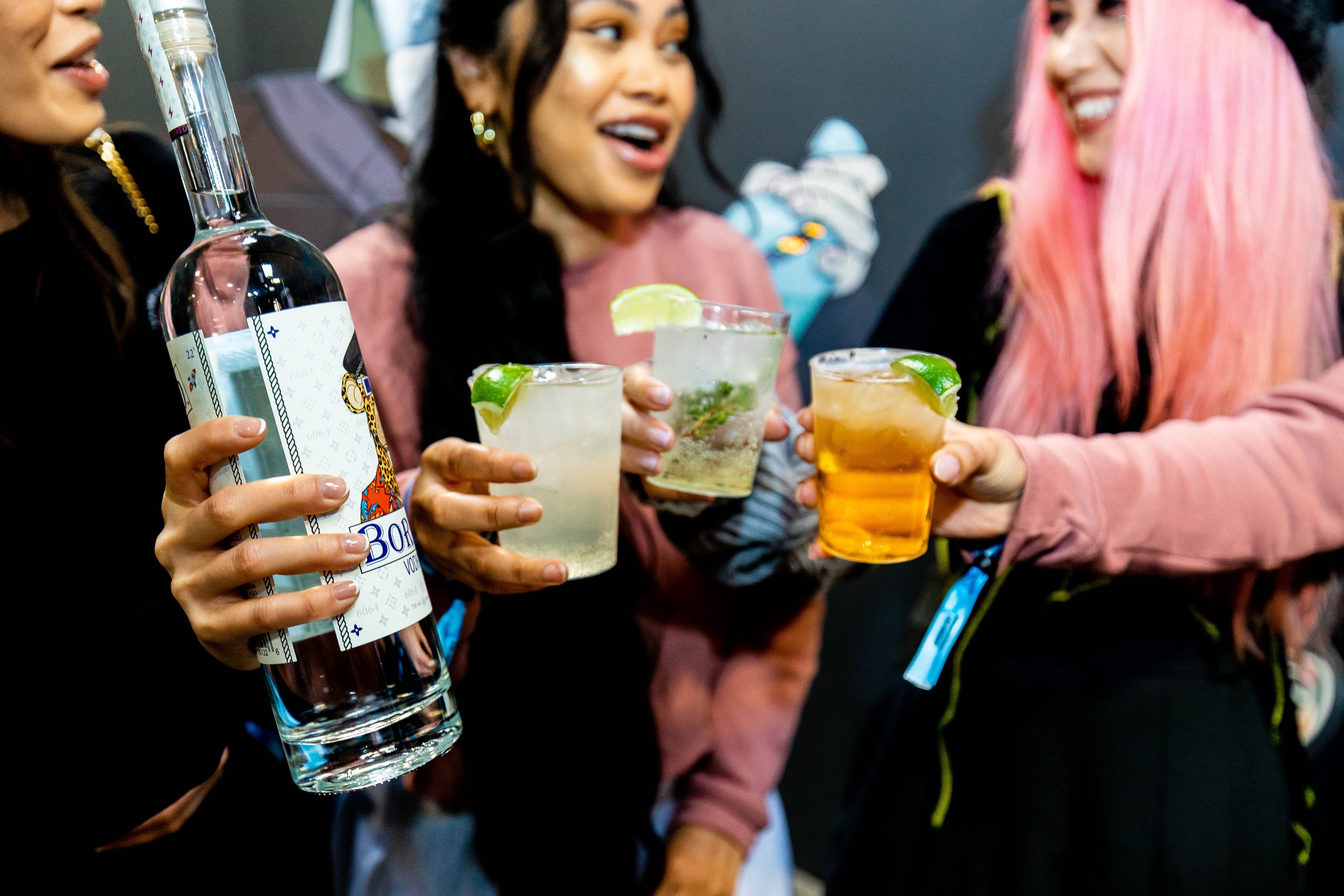 Bored Vodka Combo Pack being enjoyed at a gathering, featuring cocktails and friends celebrating together.