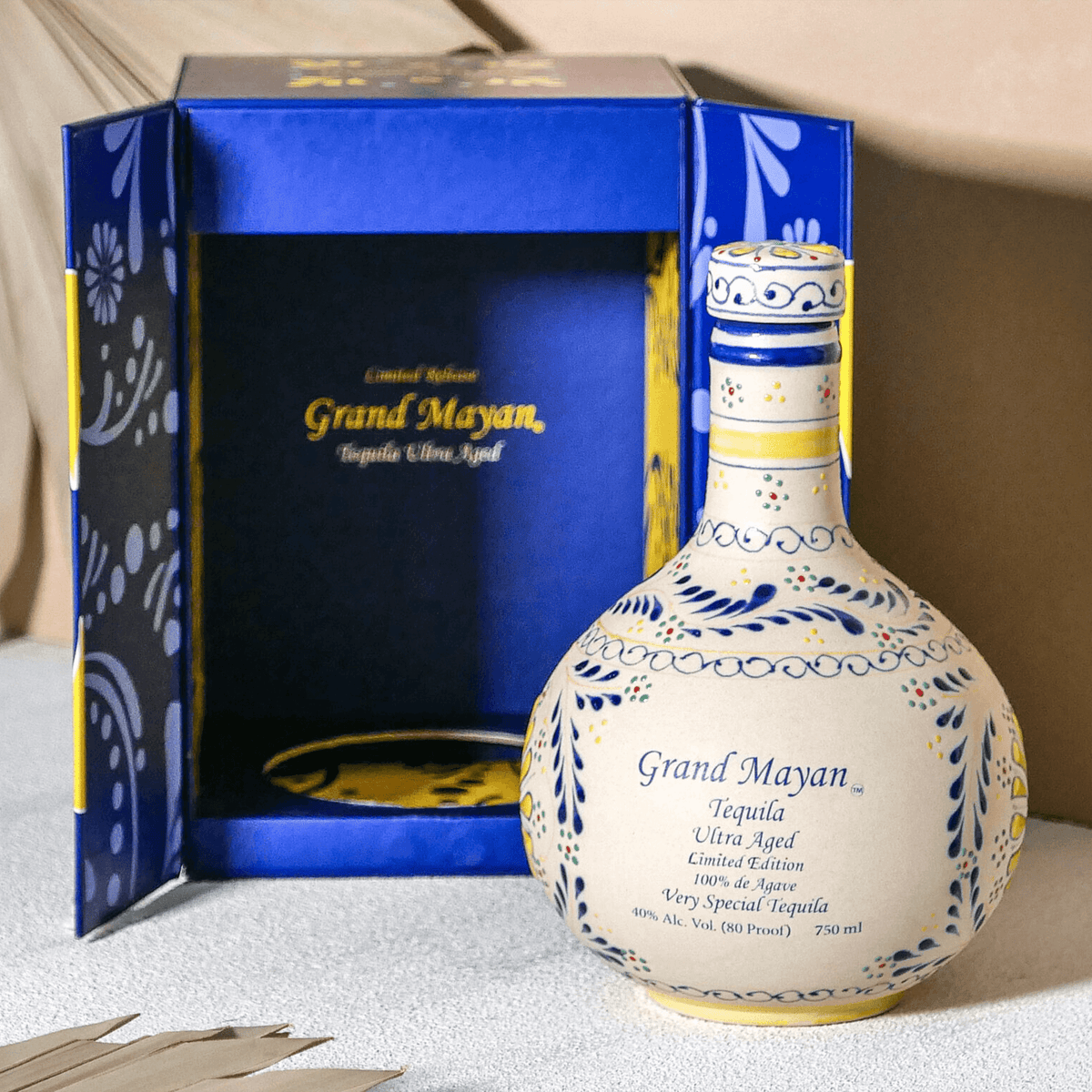 Grand Mayan Limited Edition Ultra Añejo Tequila bottle in decorative box, showcasing premium craftsmanship.