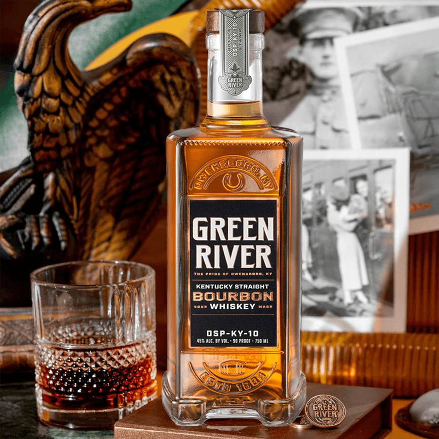 Green River Full Proof Kentucky Straight Bourbon bottle with whiskey glass and vintage photos in the background.