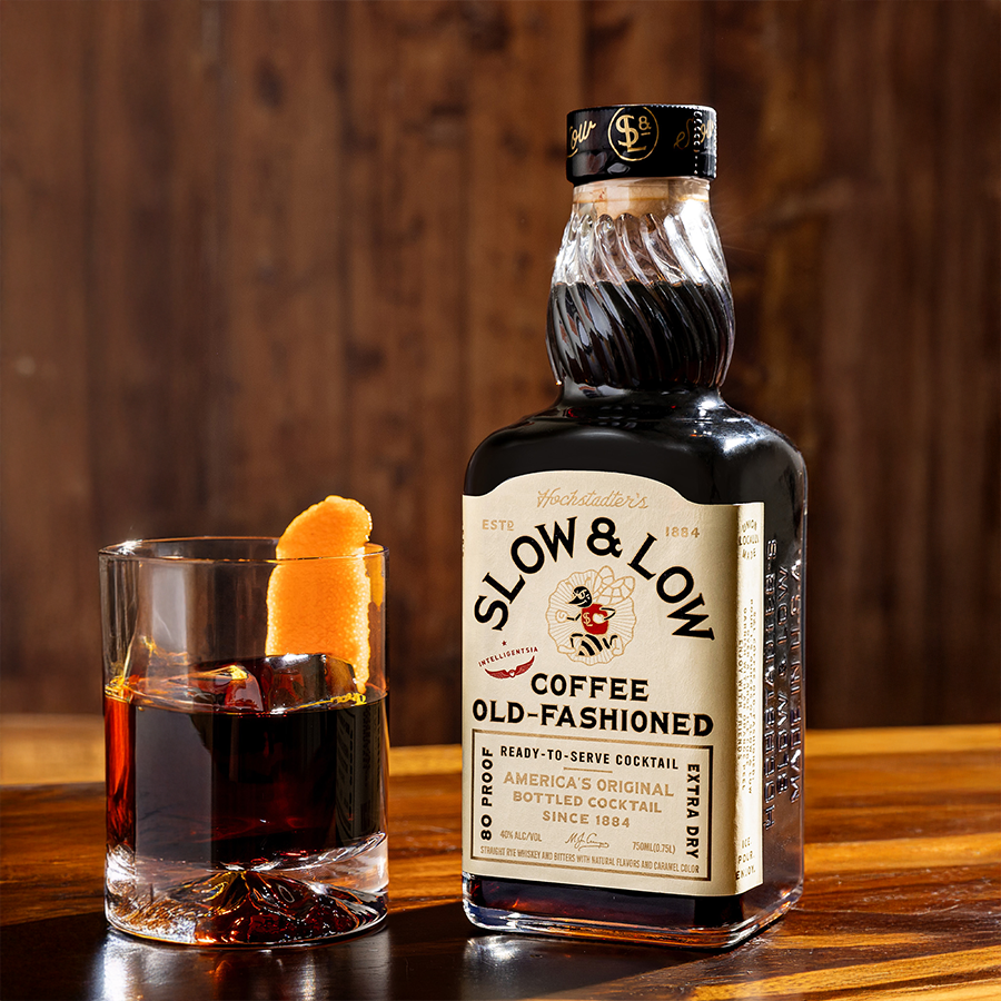 Hochstadter's Slow & Low Coffee Old Fashioned cocktail bottle and glass with orange peel garnish