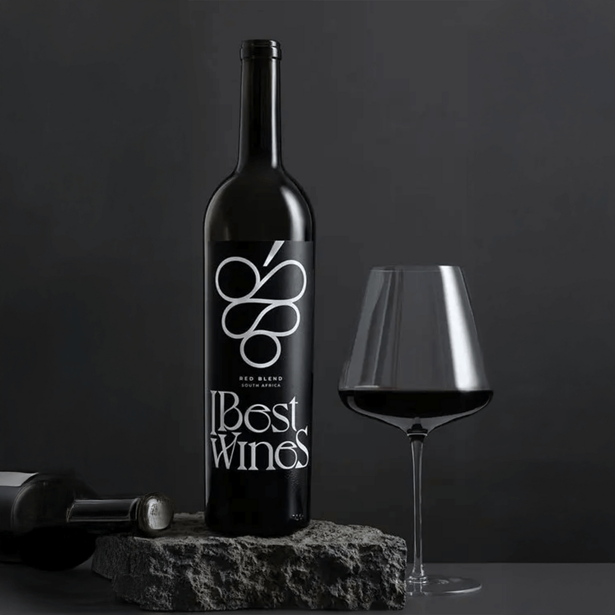 IBest Wines Art Red Blend bottle with a glass showcasing deep red wine against a dark background.