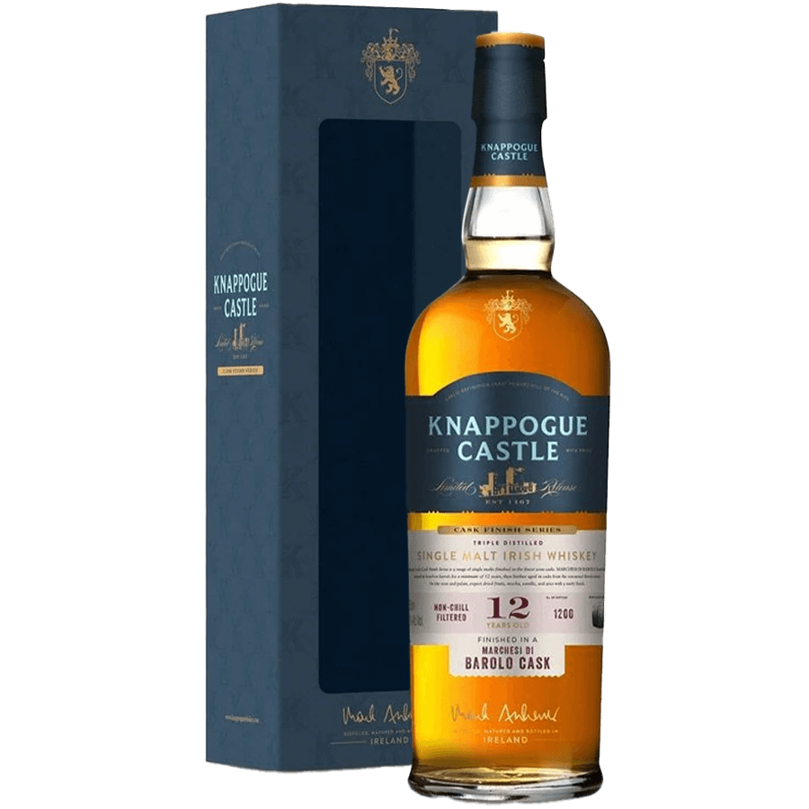 Knappogue Castle 12 Year Irish Whiskey in Barolo cask finish, presented in a stylish box, showcasing its rich amber color.