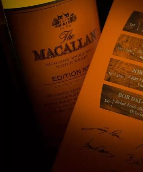 Macallan Edition No. 2 Single Malt Scotch bottle with tasting notes and signatures on an orange background.