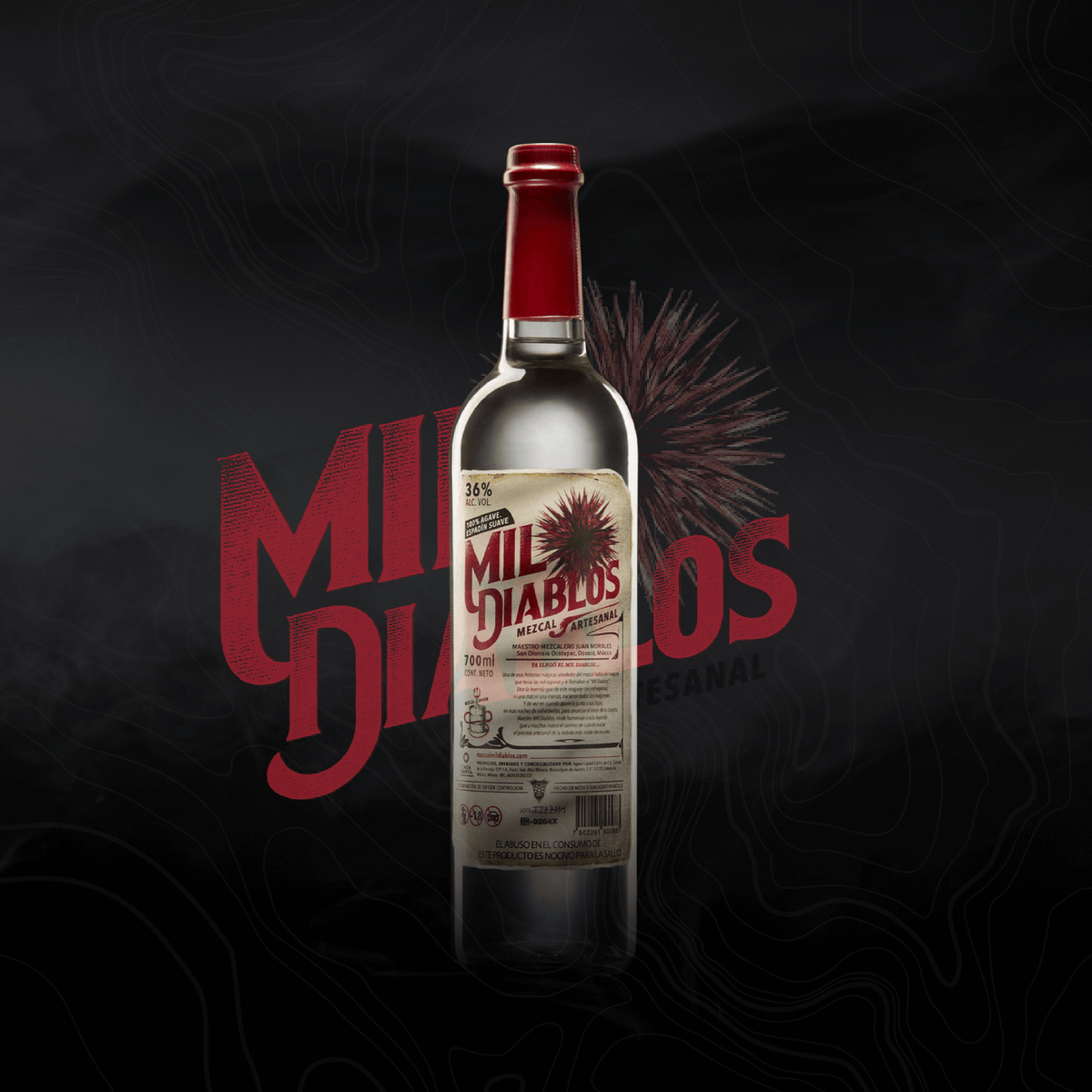 Bottle of Mil Diablos Mezcal on a dark background, showcasing its artisanal craftsmanship and branding.