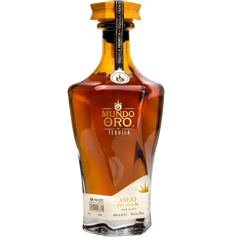 Mundo De Oro Añejo tequila bottle showcasing its rich amber color and premium craftsmanship.
