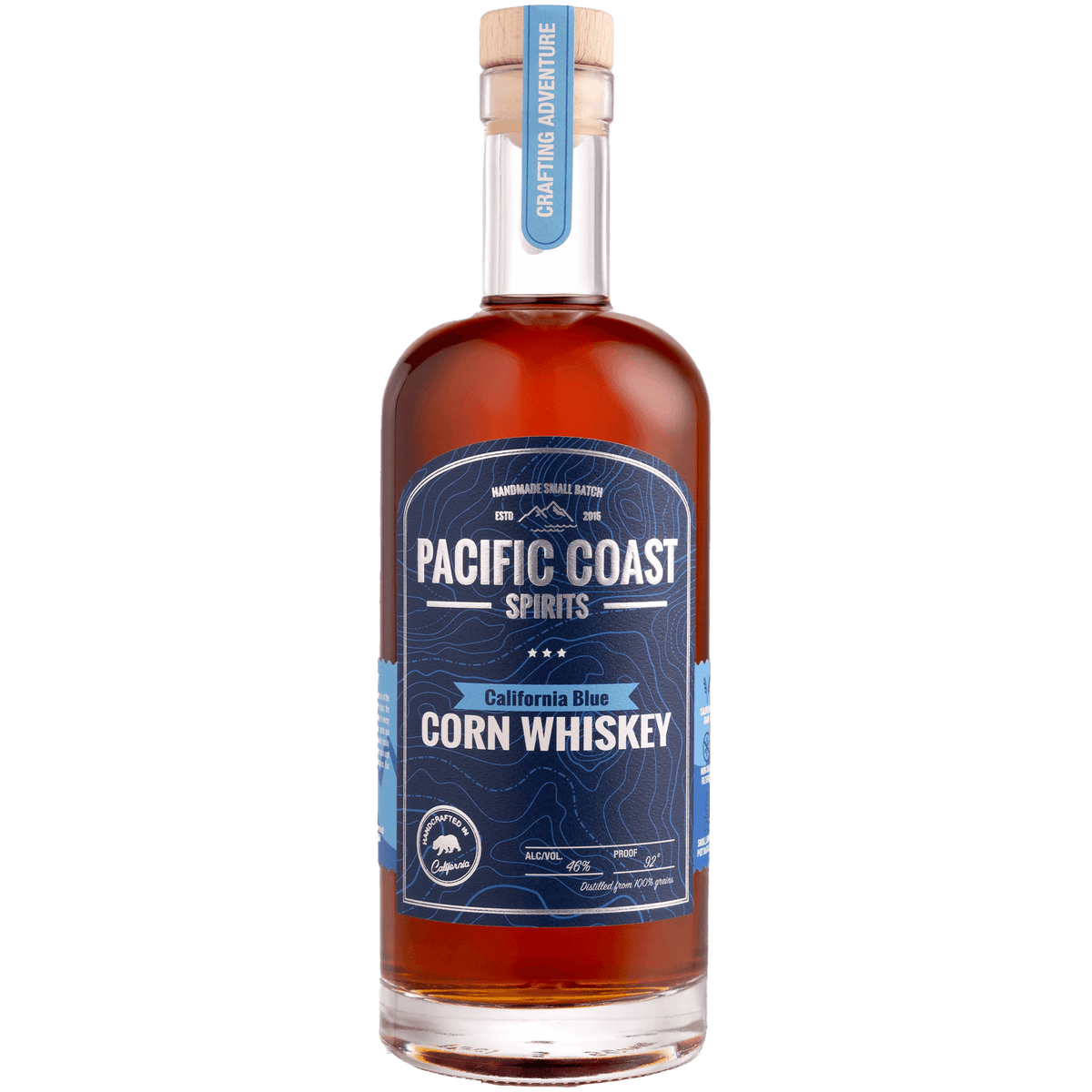 Bottle of Pacific Coast California Blue Corn Whiskey showcasing its vibrant color and unique design.