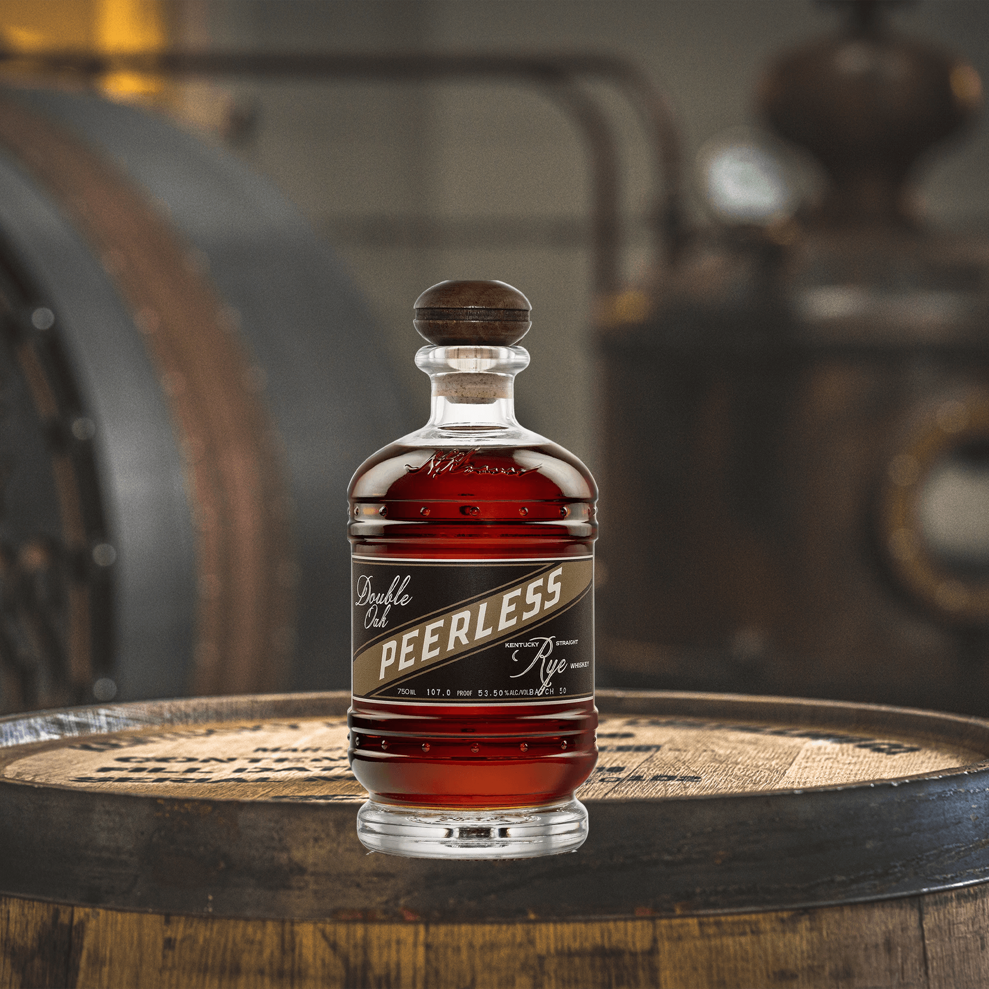 Peerless Double Oak Rye Whiskey bottle showcased on a wooden barrel, highlighting its rich color and unique design.