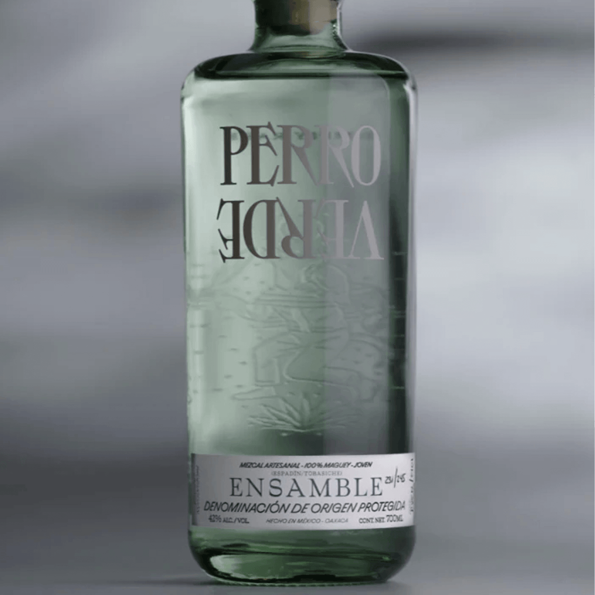 Perro Verde Ensamble Mezcal 700ml bottle showcasing artisanal design with unique lettering and label details.