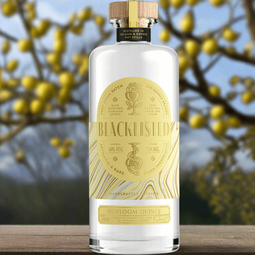 Blacklisted Heirloom Quince Brandy bottle with yellow label on natural background, 40% ABV, crafted from heirloom quinces.