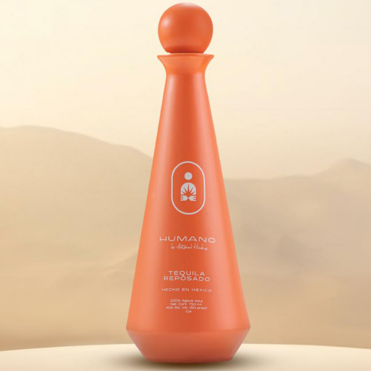 Humano Reposado Tequila bottle with unique design, showcasing traditional craftsmanship and pure ingredients.