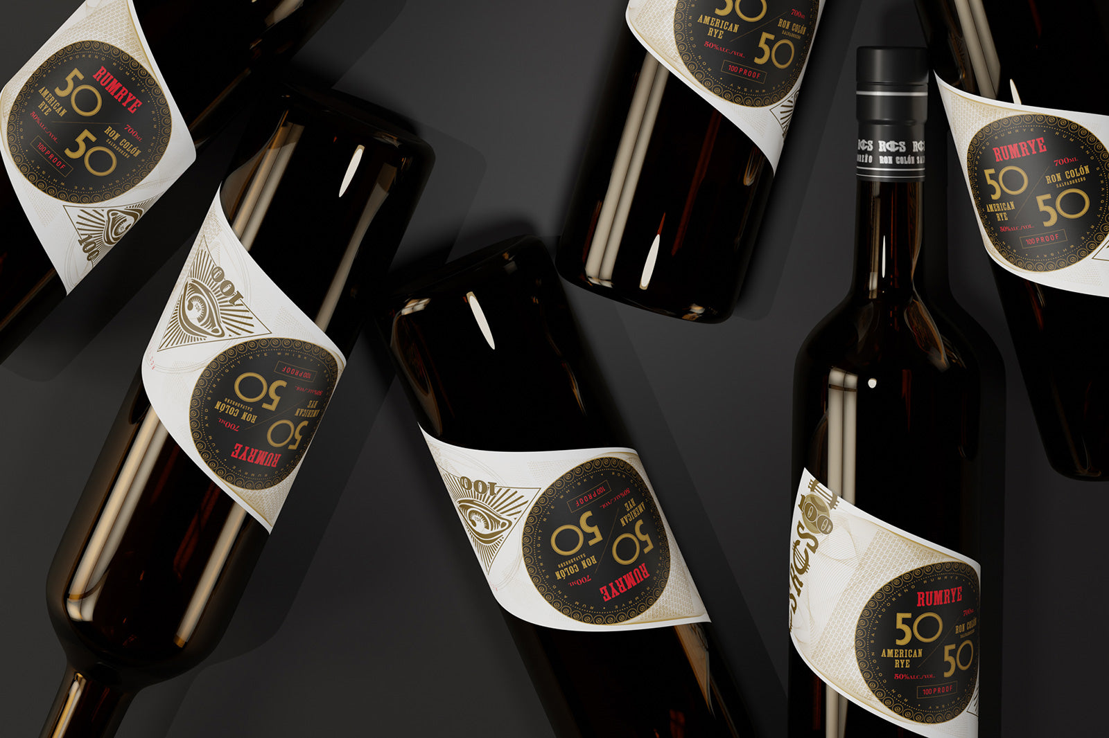 Ron Colón Salvadoreño RumRye bottles featuring a unique label design on a dark background.