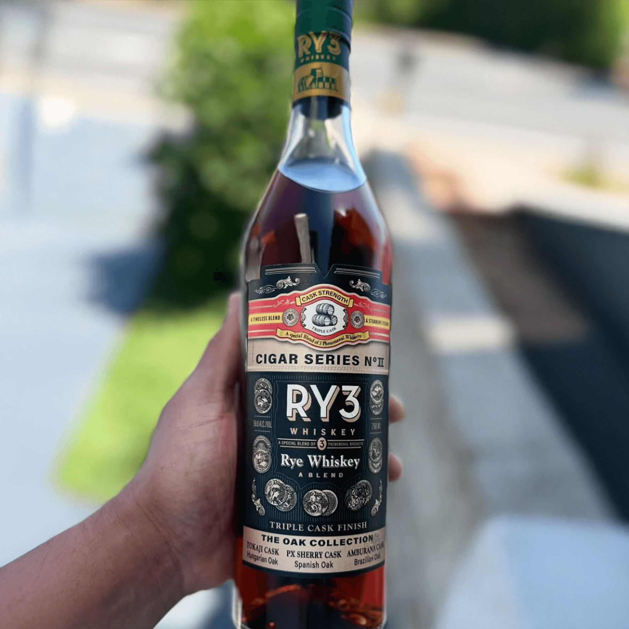RY3 Cigar Series No. II Rye Whiskey from The Oak Collection, showcasing its unique bottle design and triple cask finish.