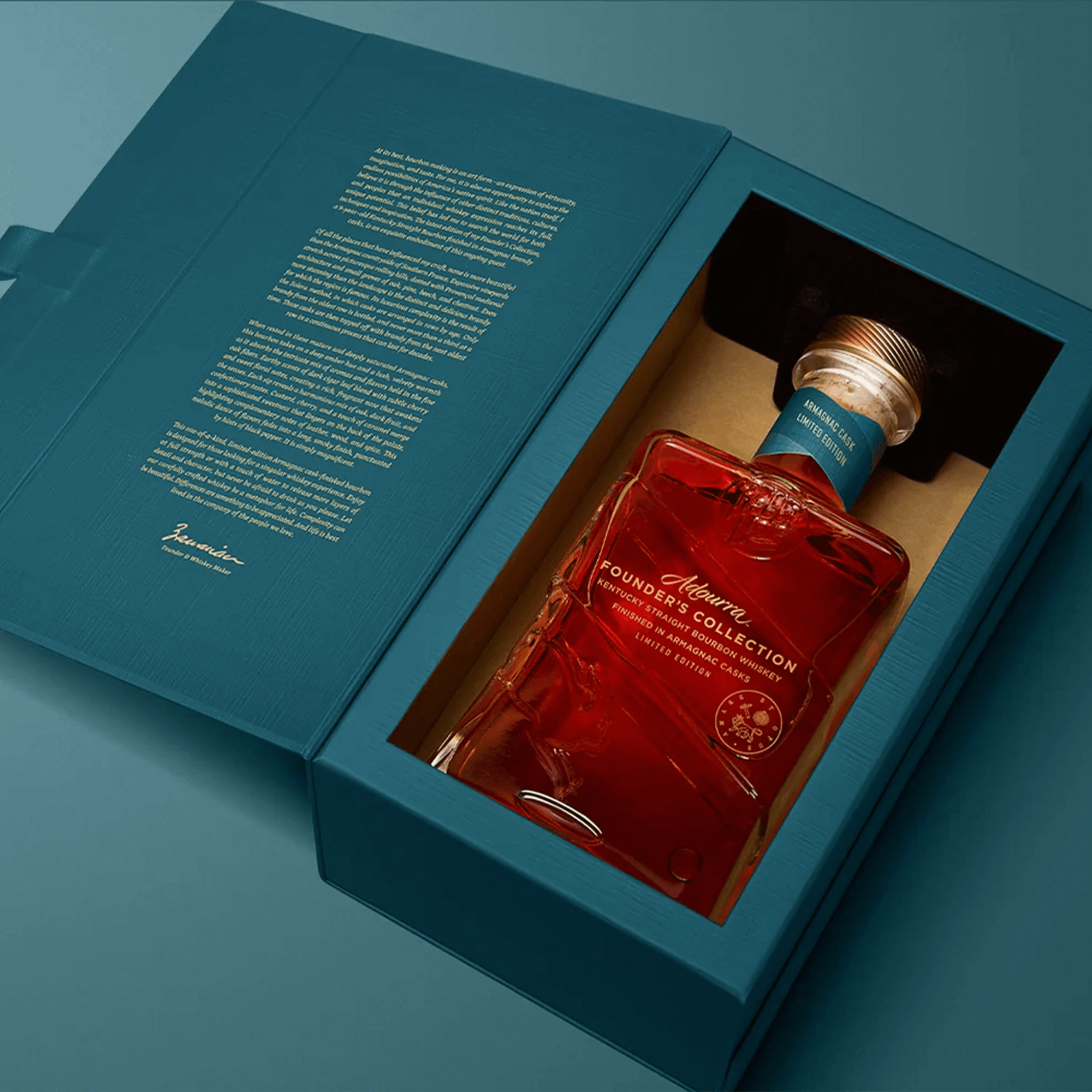 Rabbit Hole Adourra Founder's Collection bourbon in an elegant teal box, showcasing luxury whiskey craftsmanship.