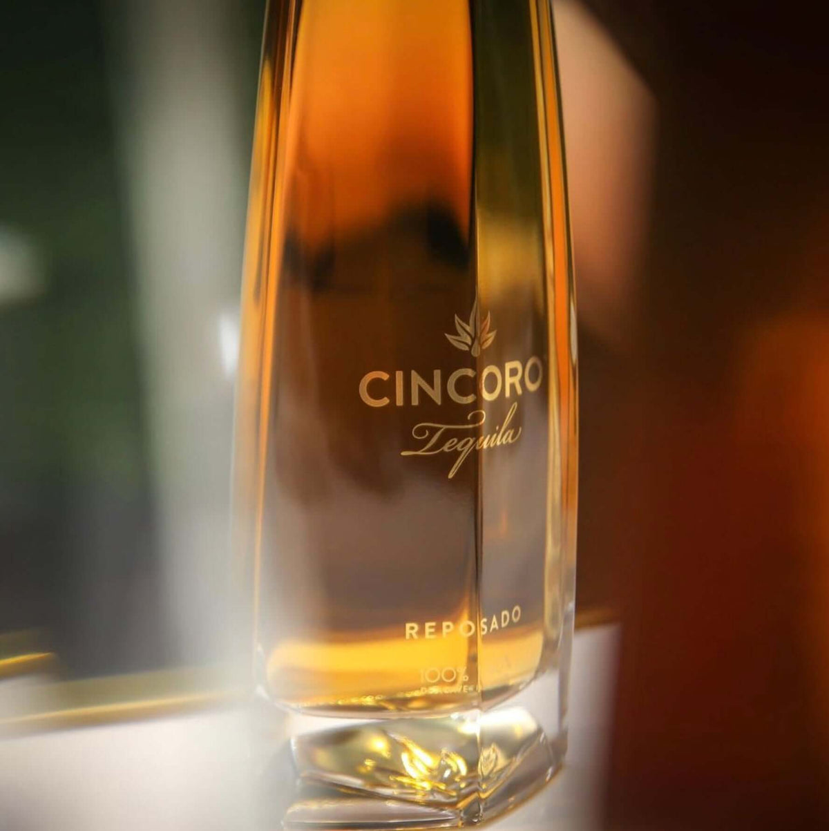 Cincoro Reposado Tequila bottle with smooth amber color, highlighting its unique aging and flavor profile.