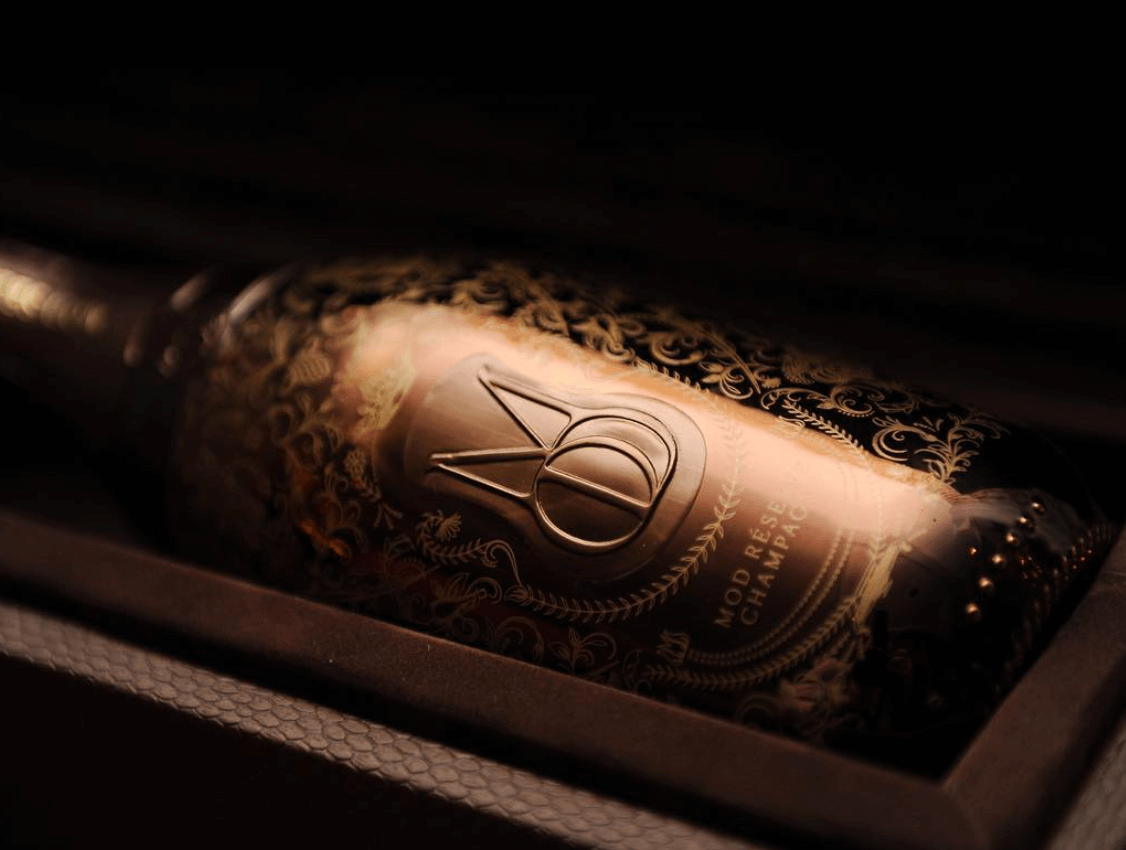 Mod Sélection Reserve Champagne bottle showcasing elegant design and detailing in a dark presentation box.