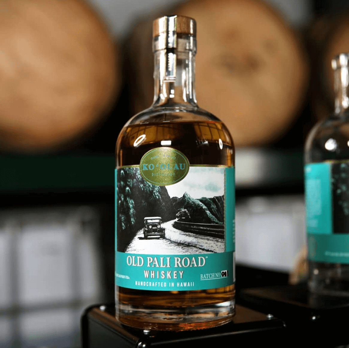 Ko'olau Distillery Old Pali Road Whiskey bottle, handcrafted in Hawaii, batch 91, showcasing its unique blend.
