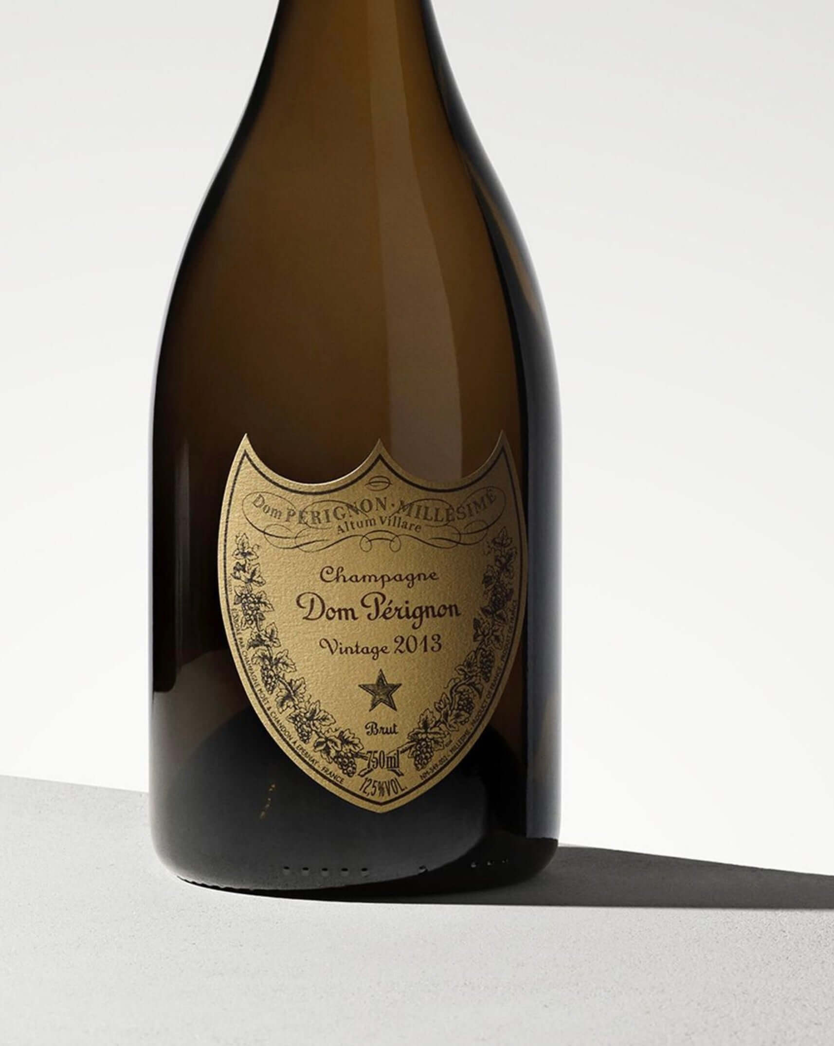 Dom Pérignon 2013 Brut Champagne bottle with vintage label, showcasing elegance and quality.