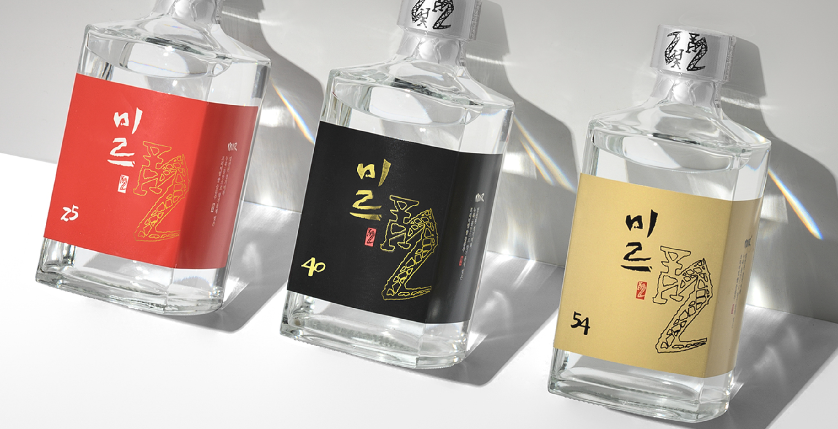 Sulseam Mir 22 Soju bottles in red, black, and gold labels showcasing traditional Korean spirit.