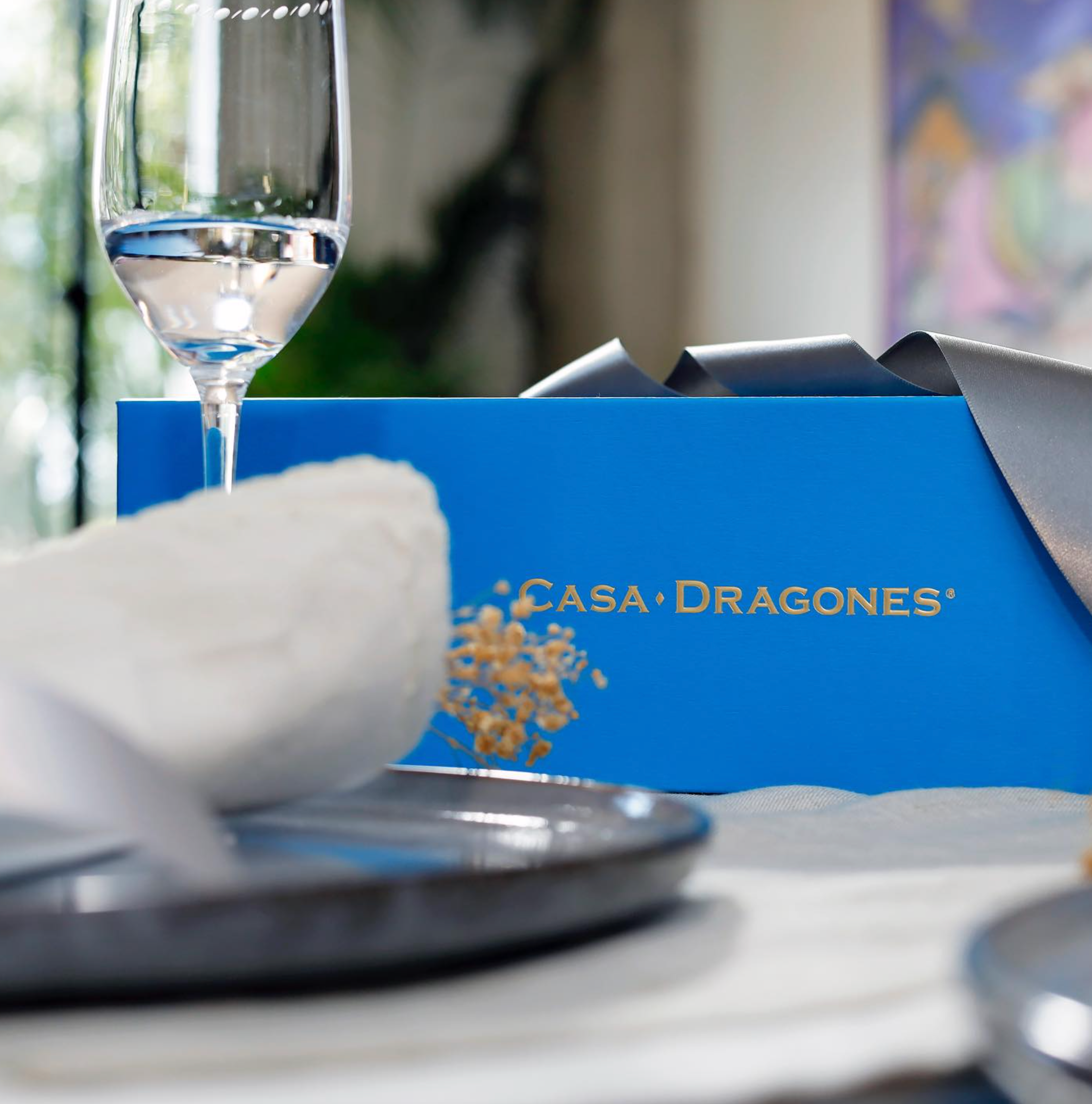 Casa Dragones Joven tequila gift set with flutes and blue packaging, perfect for tequila tasting.