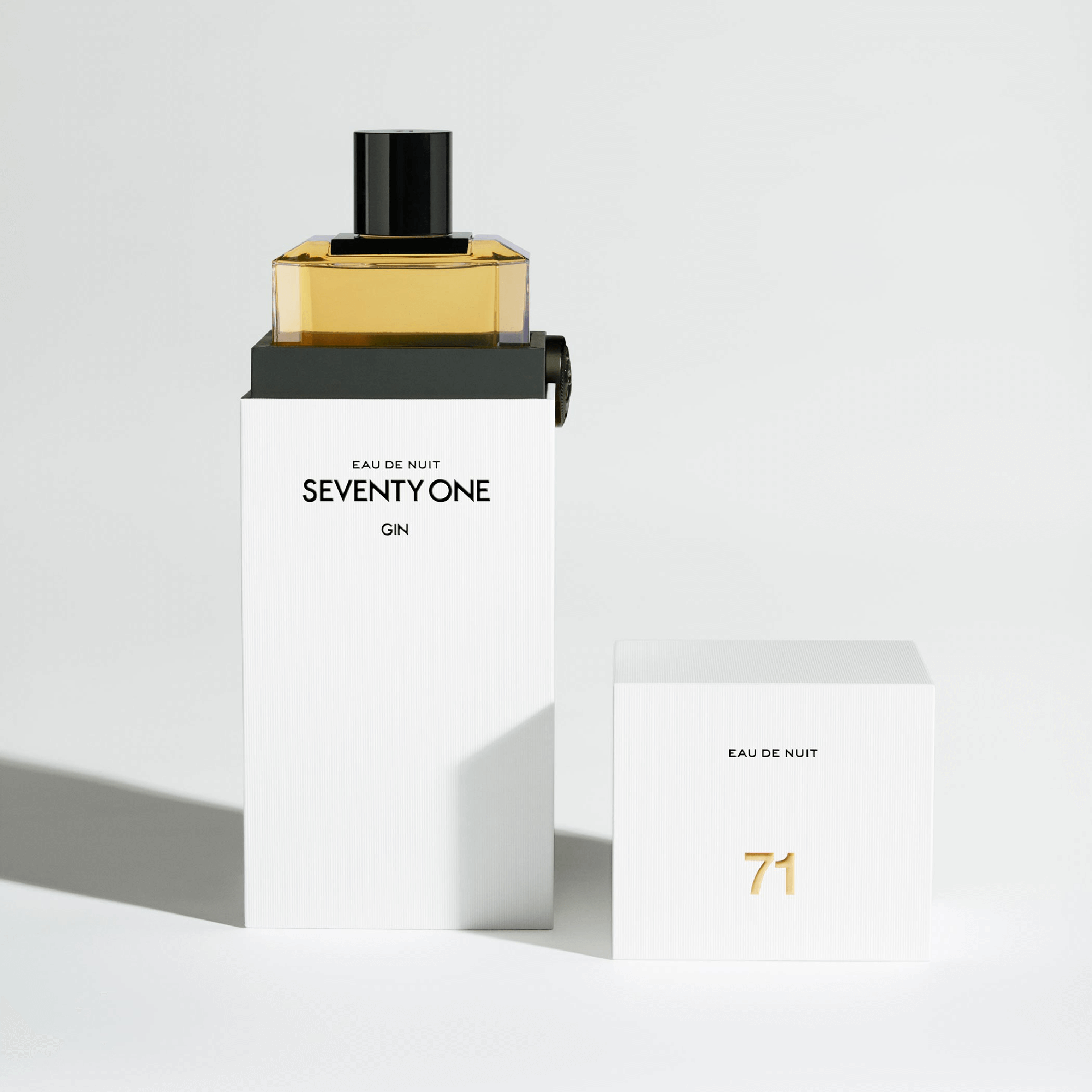 SEVENTY ONE Gin 700ml bottle and box, showcasing its elegant design and distinctive golden liquid.