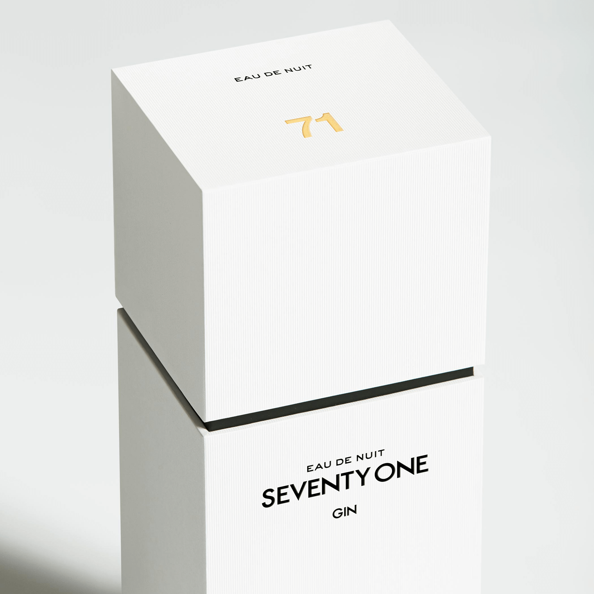 Seventy One Gin 700ml packaging, featuring elegant design with gold accents and botanical elements.