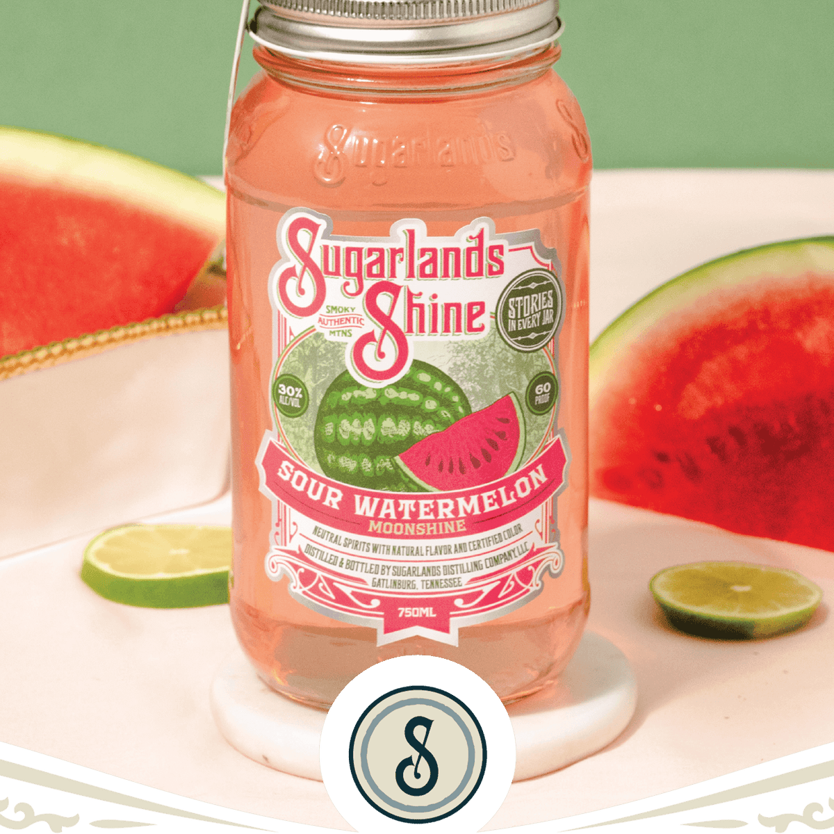 Sugarlands Shine Sour Watermelon Moonshine bottle with vibrant watermelon slices, showcasing a refreshing summer spirit.