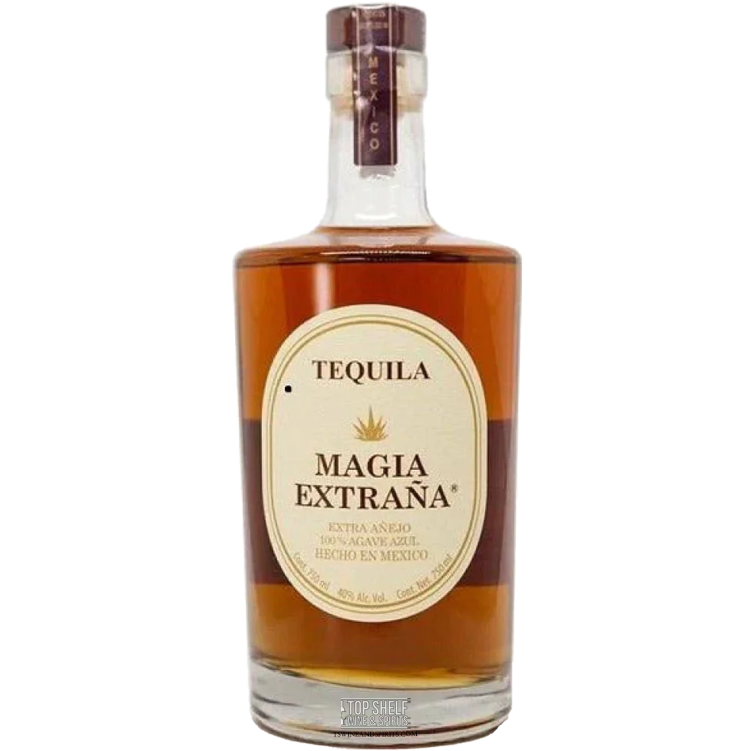 Magia Extraña Extra Añejo Tequila bottle showcasing rich amber color and elegant label, perfect for spirits enthusiasts.
