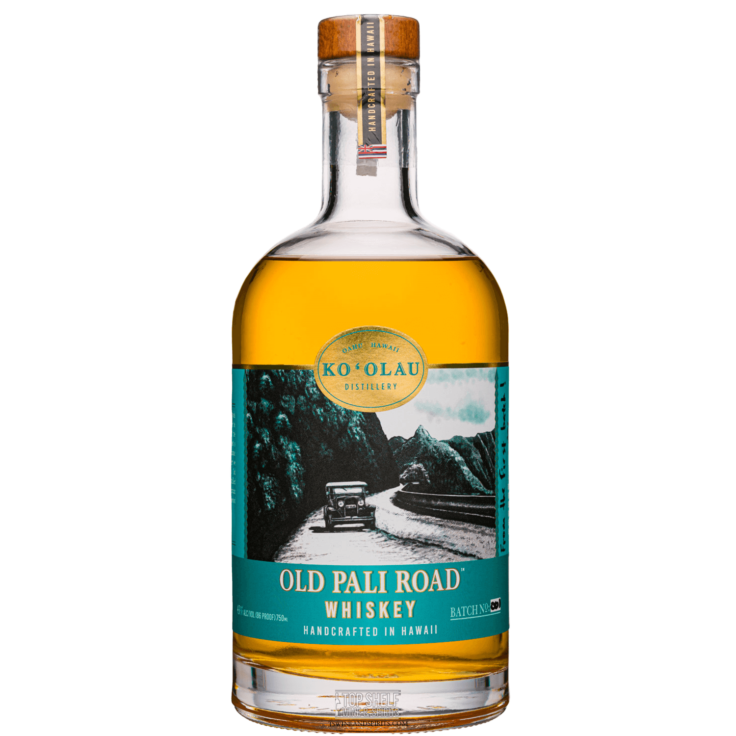 Ko'olau Distillery Old Pali Road Whiskey, handcrafted in Hawaii, showcasing its rich golden color and elegant bottle design.