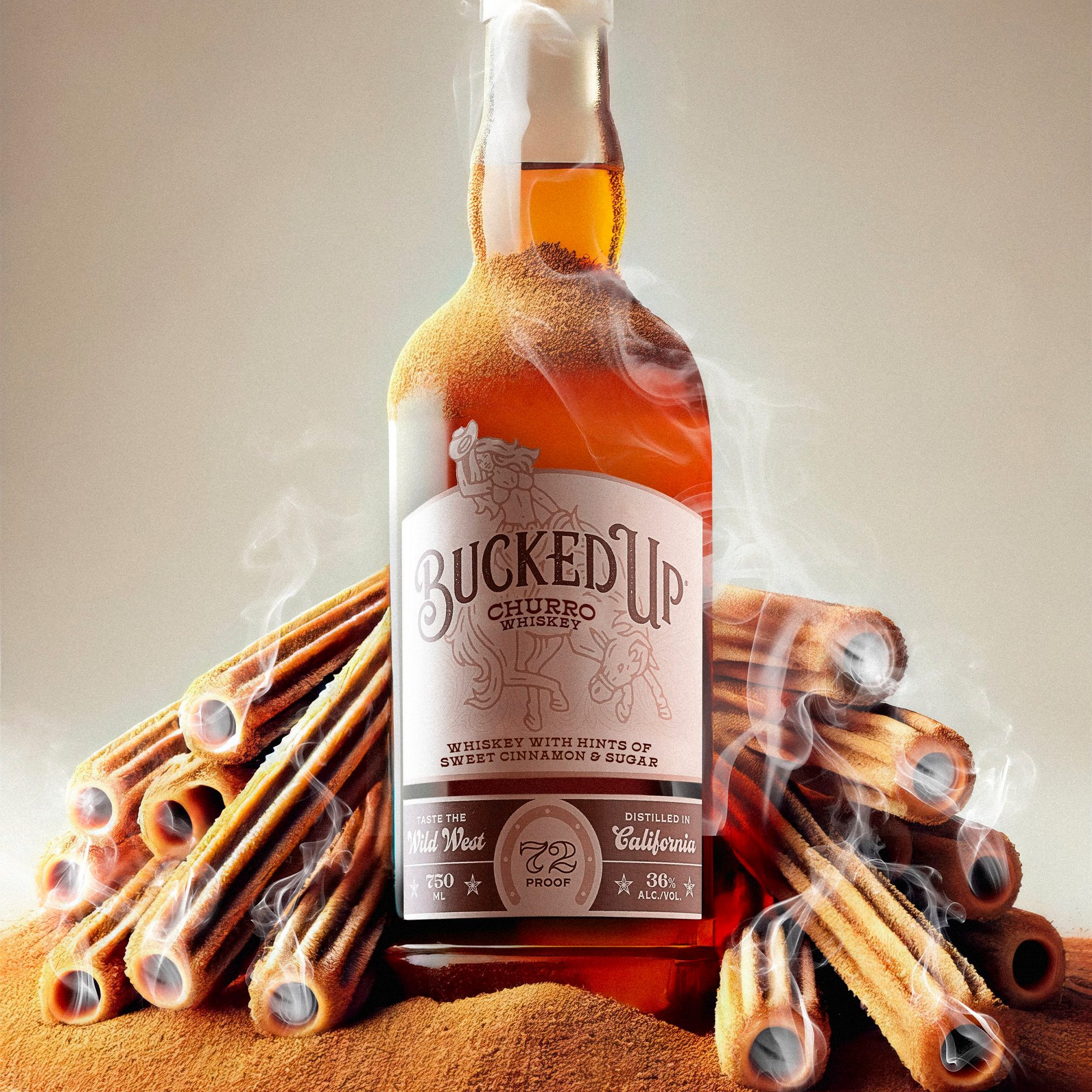 Bucked Up Churro Whiskey bottle surrounded by cinnamon sticks, showcasing sweet cinnamon and sugar flavors.