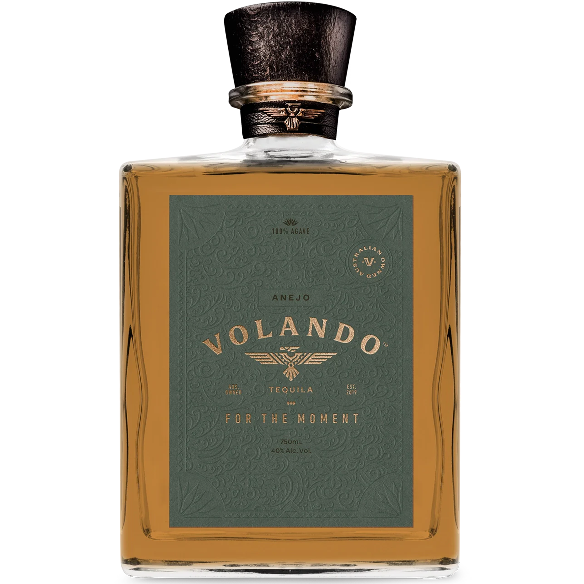 Volando Añejo Tequila bottle showcasing deep copper color and elegant label, aged over a year in whiskey barrels.