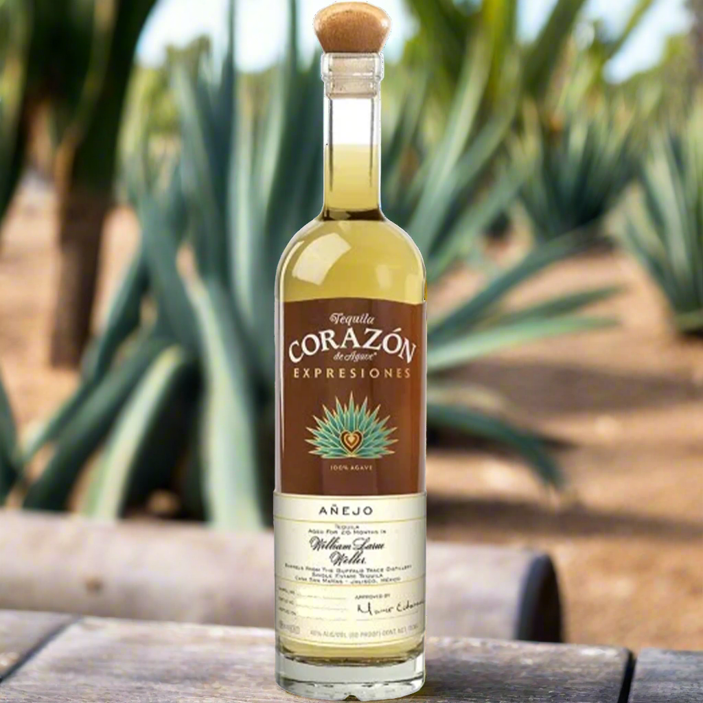 Bottle of Corazon Expressiones William Larue Weller Anejo Tequila surrounded by agave plants.