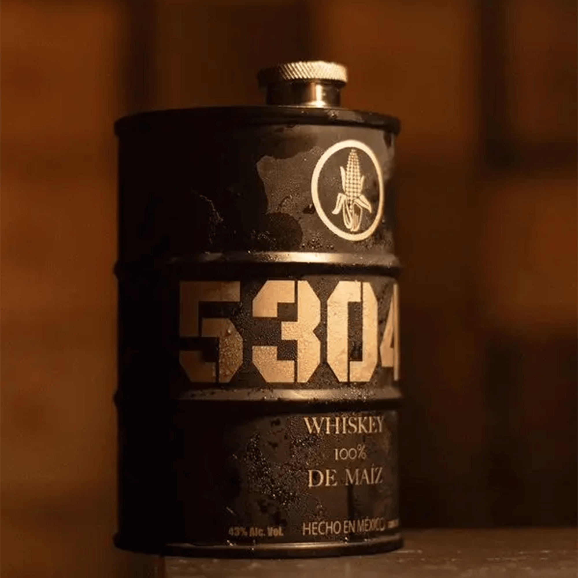 Whiskey De Maiz 53040 bottle featuring unique design and branding, reflecting authentic Mexican craftsmanship.