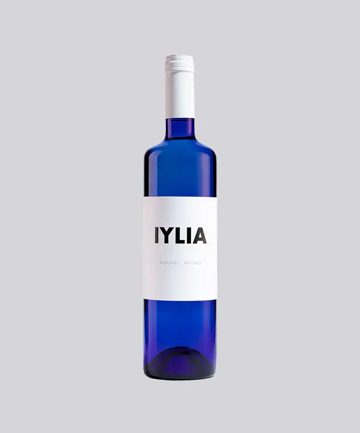Iylia Moscatel Macabeo 2020 wine bottle with a blue glass design and a minimalist white label.